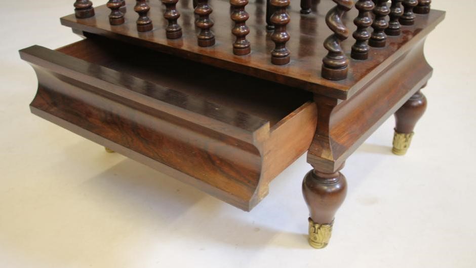 A VICTORIAN ROSEWOOD WHATNOT/CANTERBURY of oblong form Image