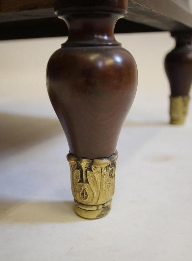 A VICTORIAN ROSEWOOD WHATNOT/CANTERBURY of oblong form Image