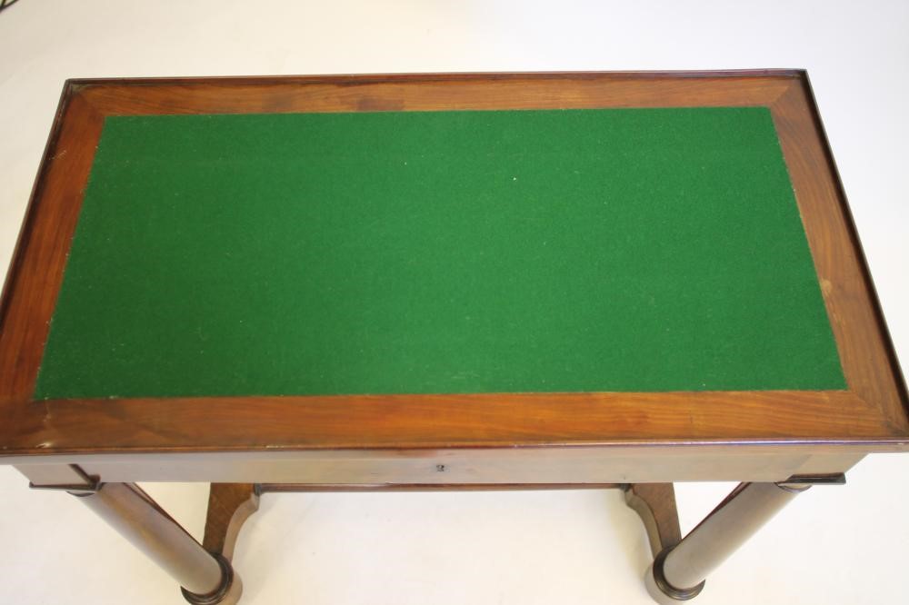AN EMPIRE STYLE MAHOGANY WRITING/GAMES TABLE Image