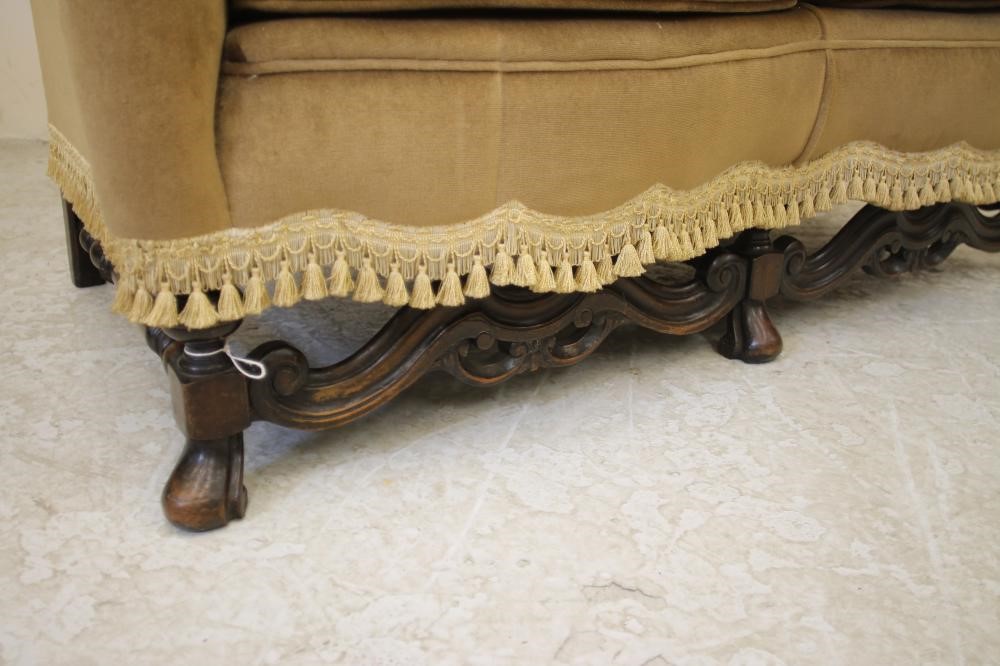 A WILLIAM & MARY STYLE WALNUT FRAMED WING BACK SOFA Image