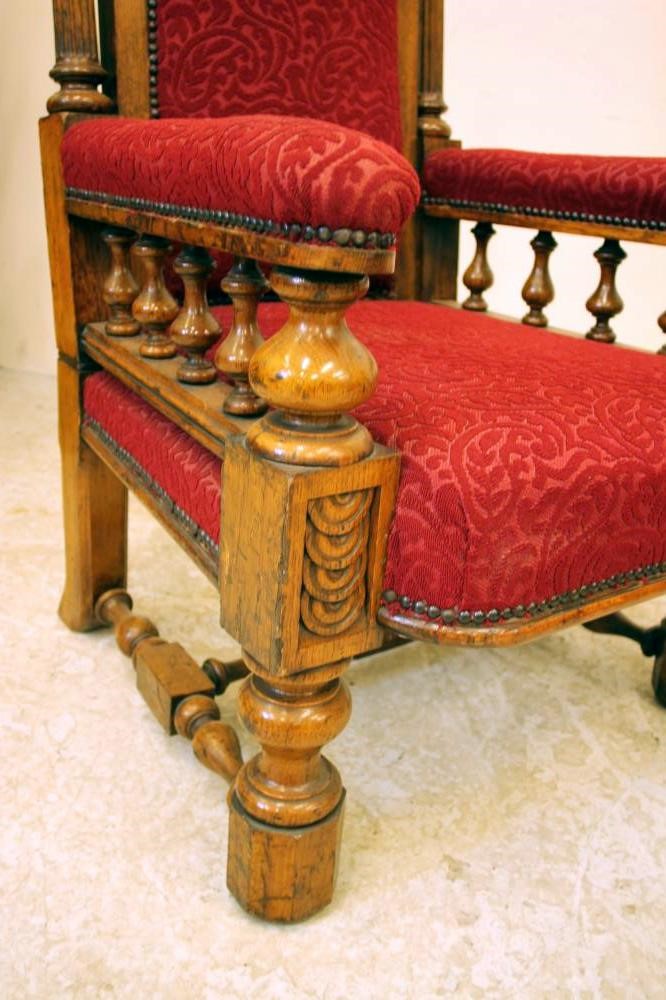 A VICTORIAN OAK MASONIC THRONE upholstered in red moquette Image