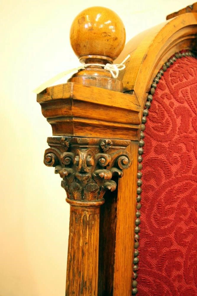 A VICTORIAN OAK MASONIC THRONE upholstered in red moquette Image