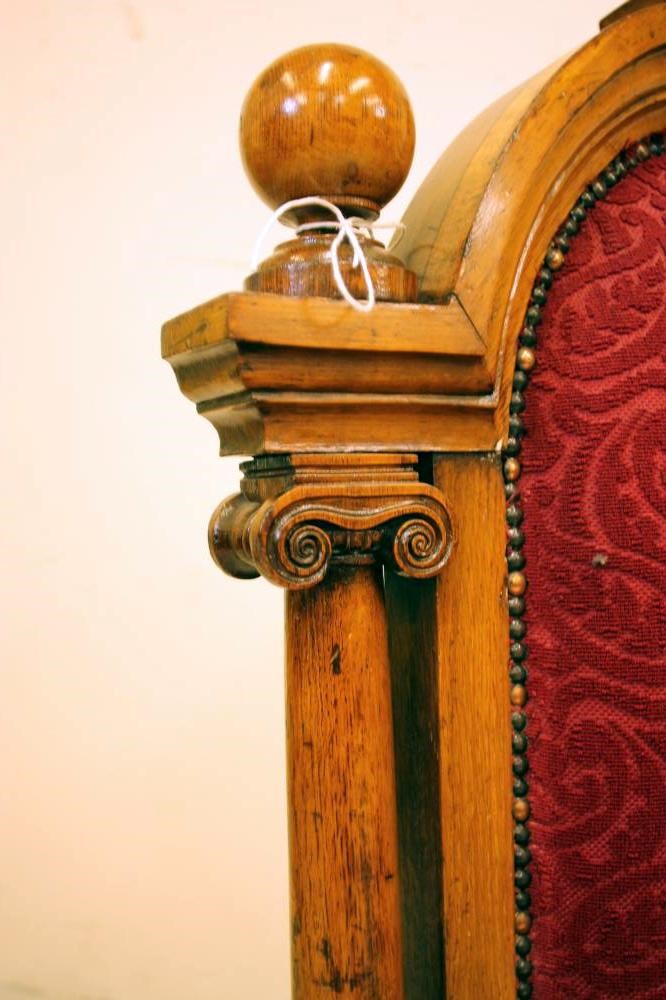 A VICTORIAN OAK MASONIC THRONE similar to the previous lot with Ionic column uprights Image