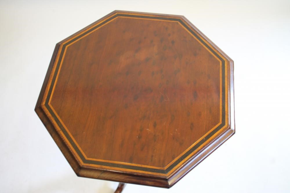 A VICTORIAN MAHOGANY WINE TABLE of octagonal form with ebony and satinwood banding Image