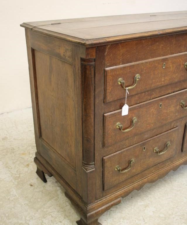 A GEORGE III OAK AND MAHOGANY BANDED LANCASHIRE DRESSER Image