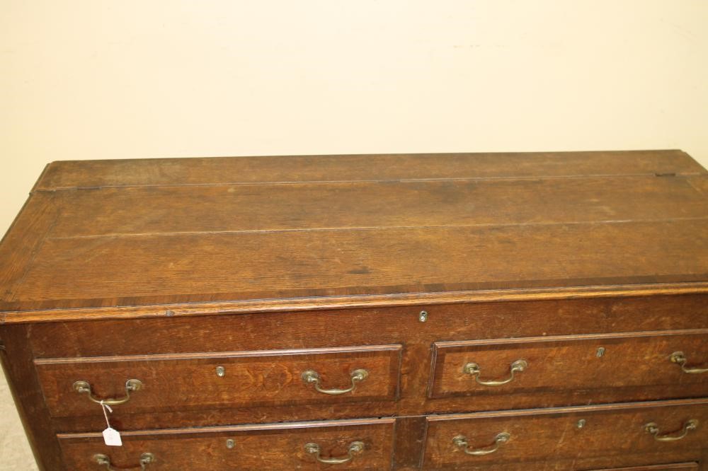 A GEORGE III OAK AND MAHOGANY BANDED LANCASHIRE DRESSER Image