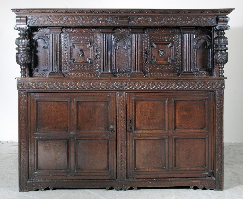 AN OAK PRESS CUPBOARD Image