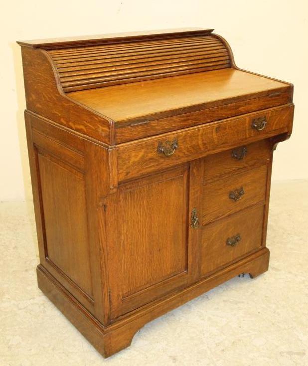 AN OAK "BRADFORD DESK" by Christopher Pratt & Sons Image