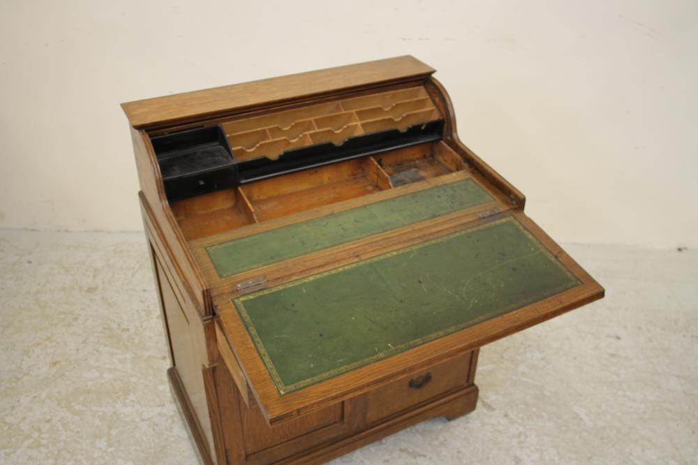 AN OAK "BRADFORD DESK" by Christopher Pratt & Sons Image