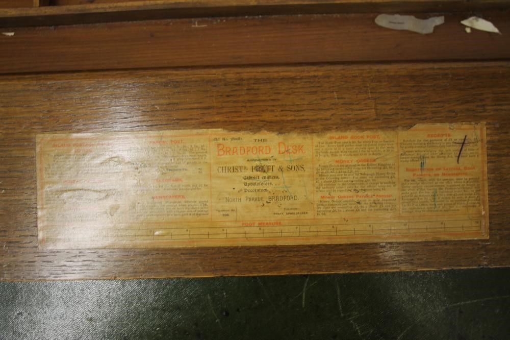 AN OAK "BRADFORD DESK" by Christopher Pratt & Sons Image