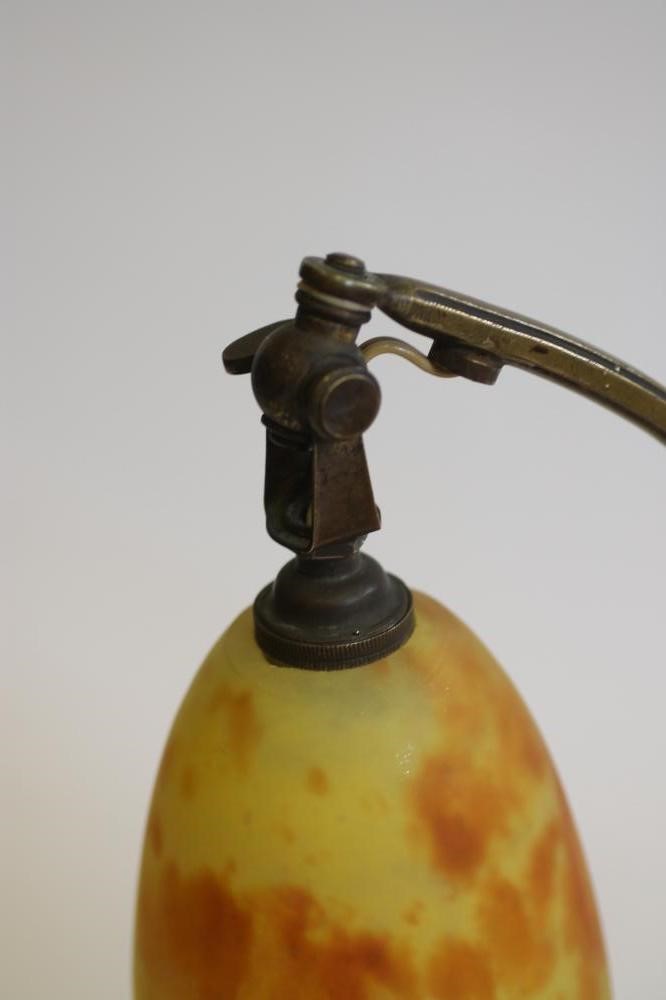 A COMPOSITE PAIR OF ART NOUVEAU MARJORELLE STYLE BRASS LAMPS Image