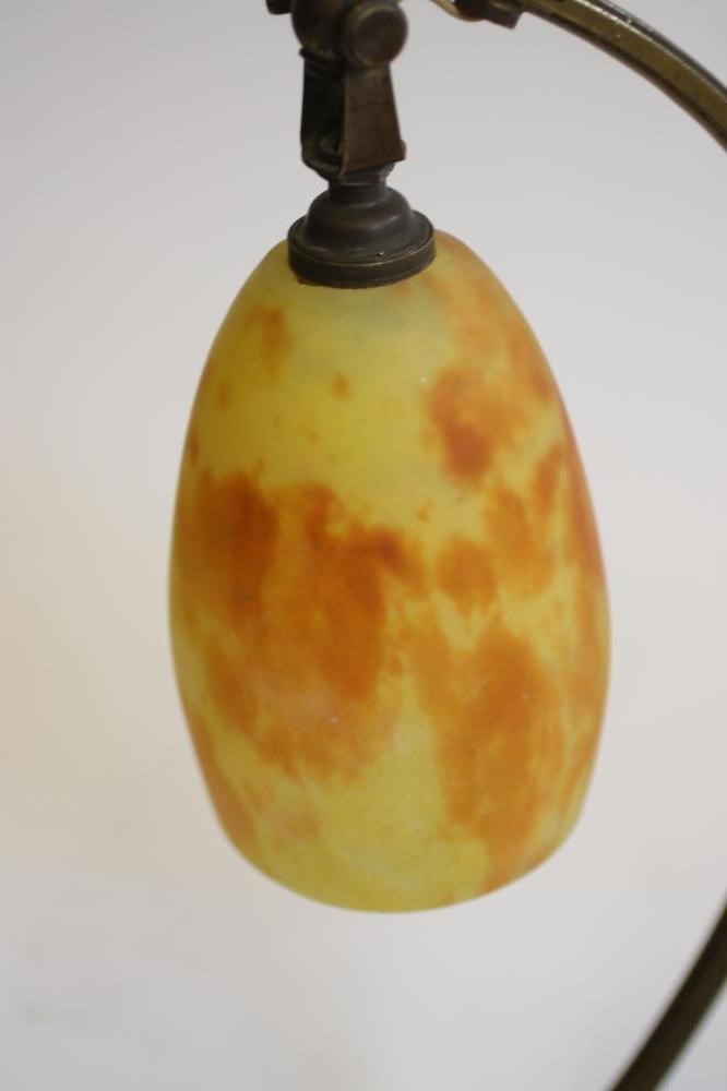 A COMPOSITE PAIR OF ART NOUVEAU MARJORELLE STYLE BRASS LAMPS Image