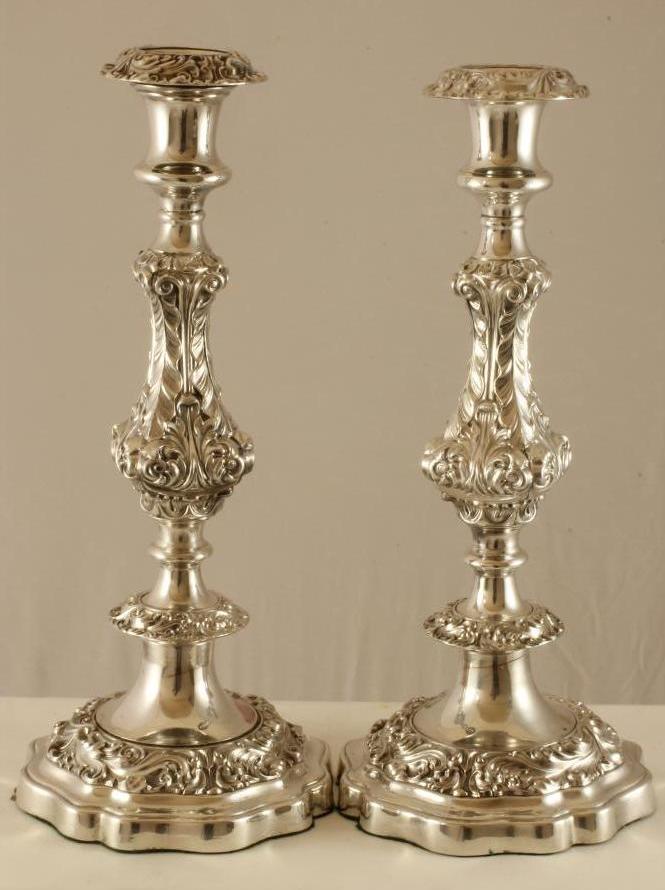 A PAIR OF OLD SHEFFIELD PLATE CANDLESTICKS Image