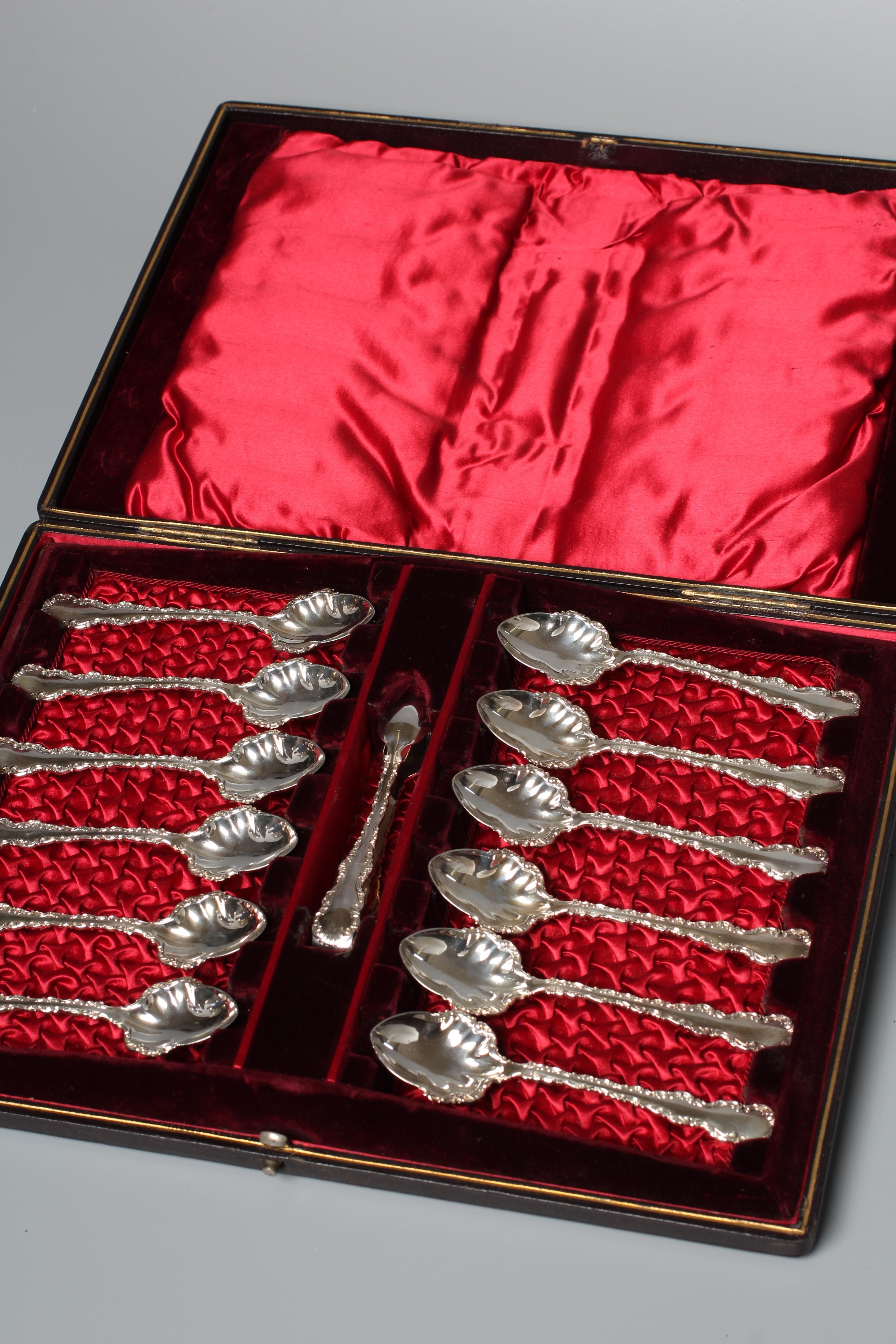 A SET OF TWELVE LATE VICTORIAN TEASPOONS WITH MATCHING TONGS by Lee & Wigfull, Sheffield 1896, with Image