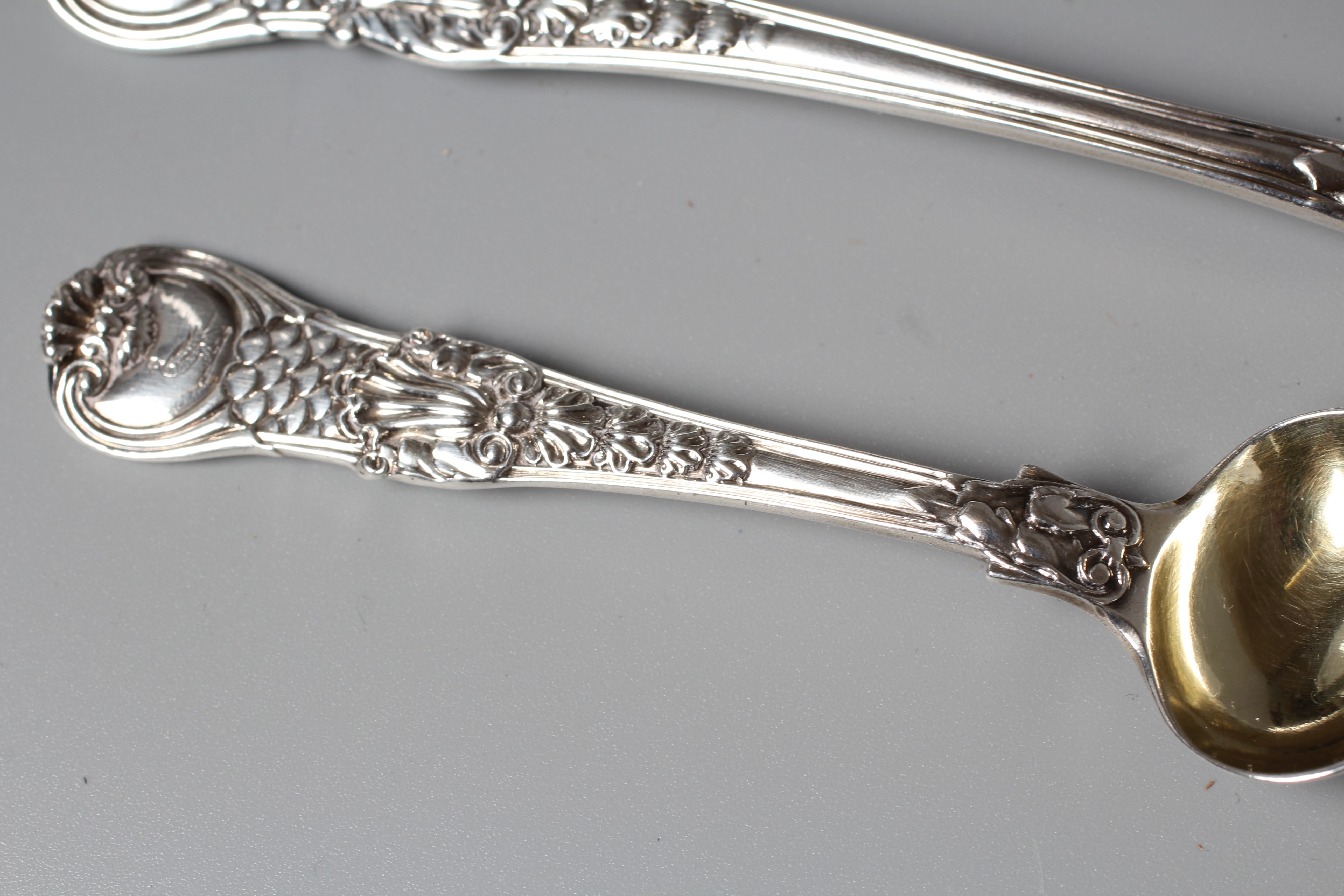 A GEORGE IV COBURG PATTERN SALT AND MUSTARD SPOON by Williams Fearn & Eley, London 1823, with oyster Image