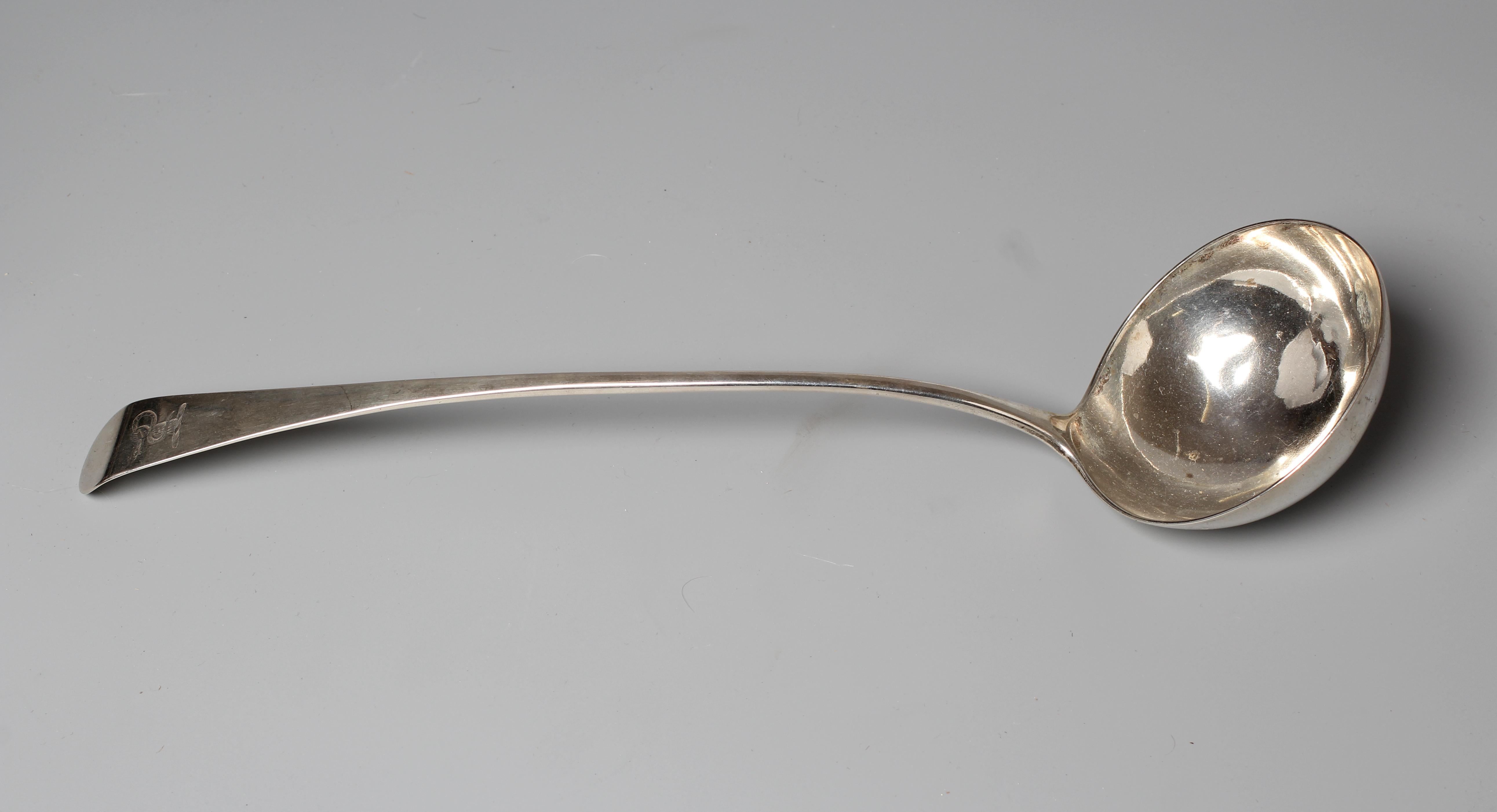 A GEORGE III OLD ENGLISH PATTERN SOUP LADLE probably by Thomas Wallis II, London 1803, engraved with Image