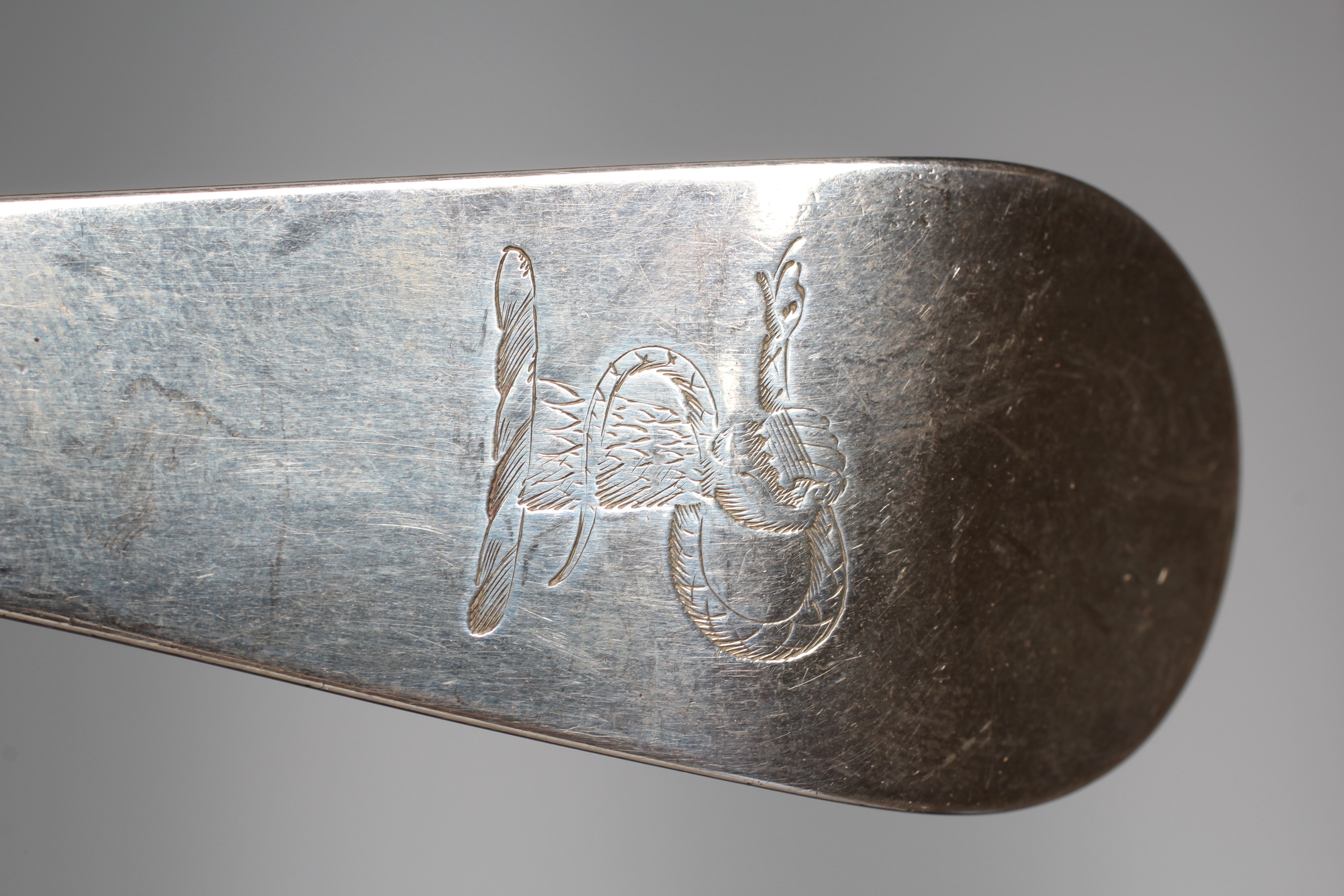 A GEORGE III OLD ENGLISH PATTERN SOUP LADLE probably by Thomas Wallis II, London 1803, engraved with Image