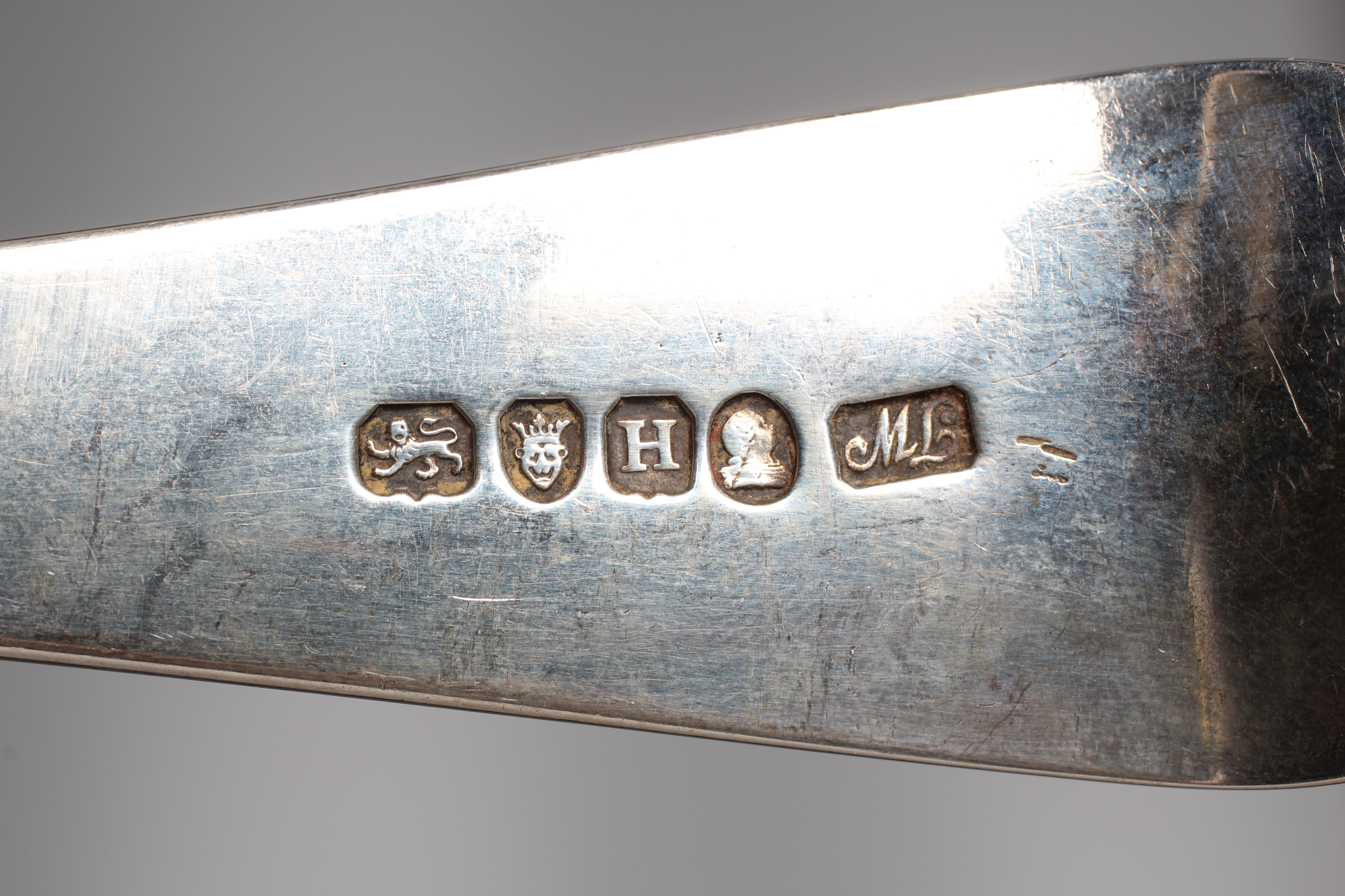 A GEORGE III OLD ENGLISH PATTERN SOUP LADLE probably by Thomas Wallis II, London 1803, engraved with Image