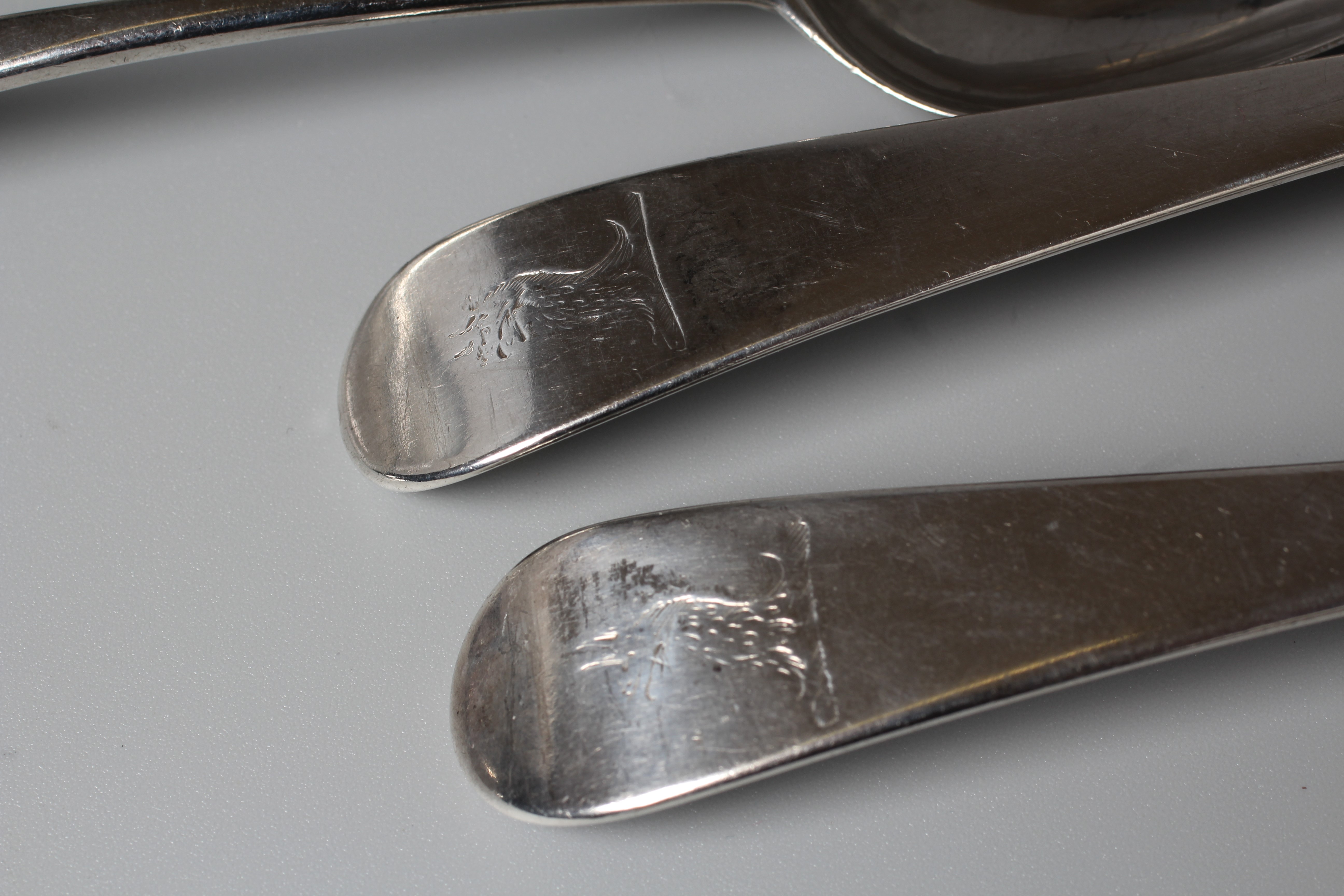 A COLLECTION OF IRISH FLATWARE comprising a set of three each dessert forks and spoons by Tudor & Image