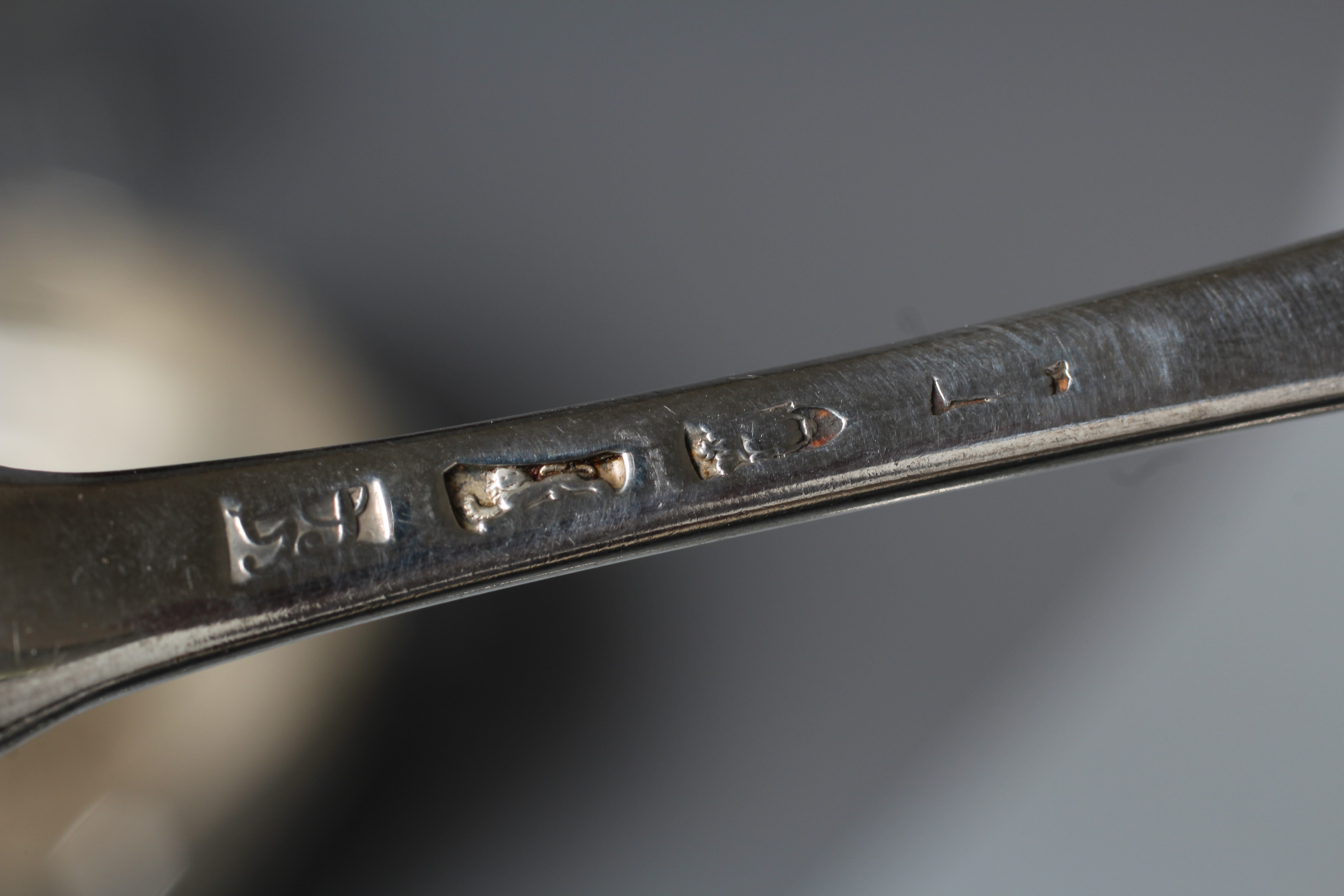A COLLECTION OF IRISH FLATWARE comprising a set of three each dessert forks and spoons by Tudor & Image