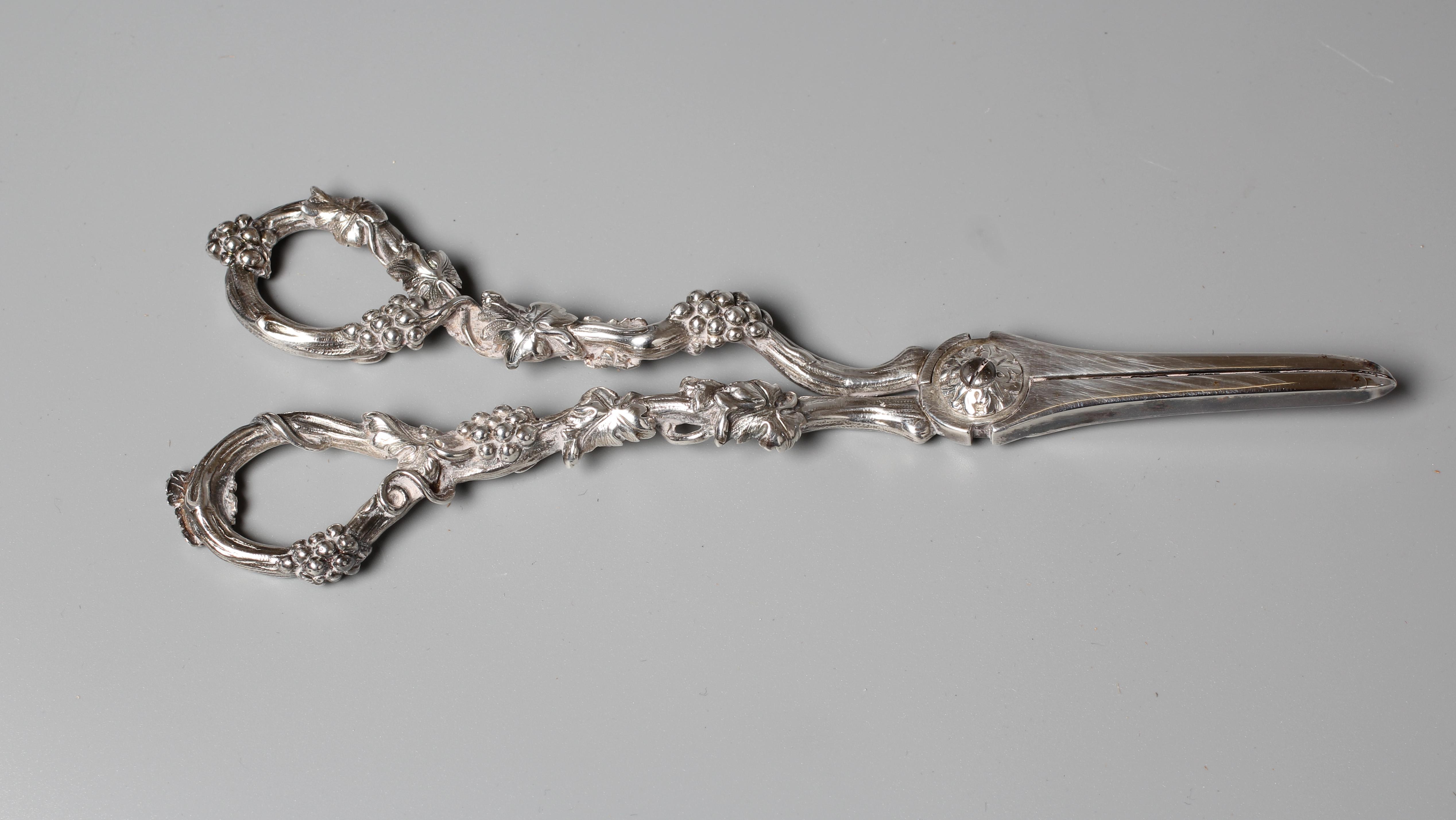 A PAIR OF WILLIAM IV GRAPE SCISSORS by William Theobalds, with cast fruiting vine handles and Image