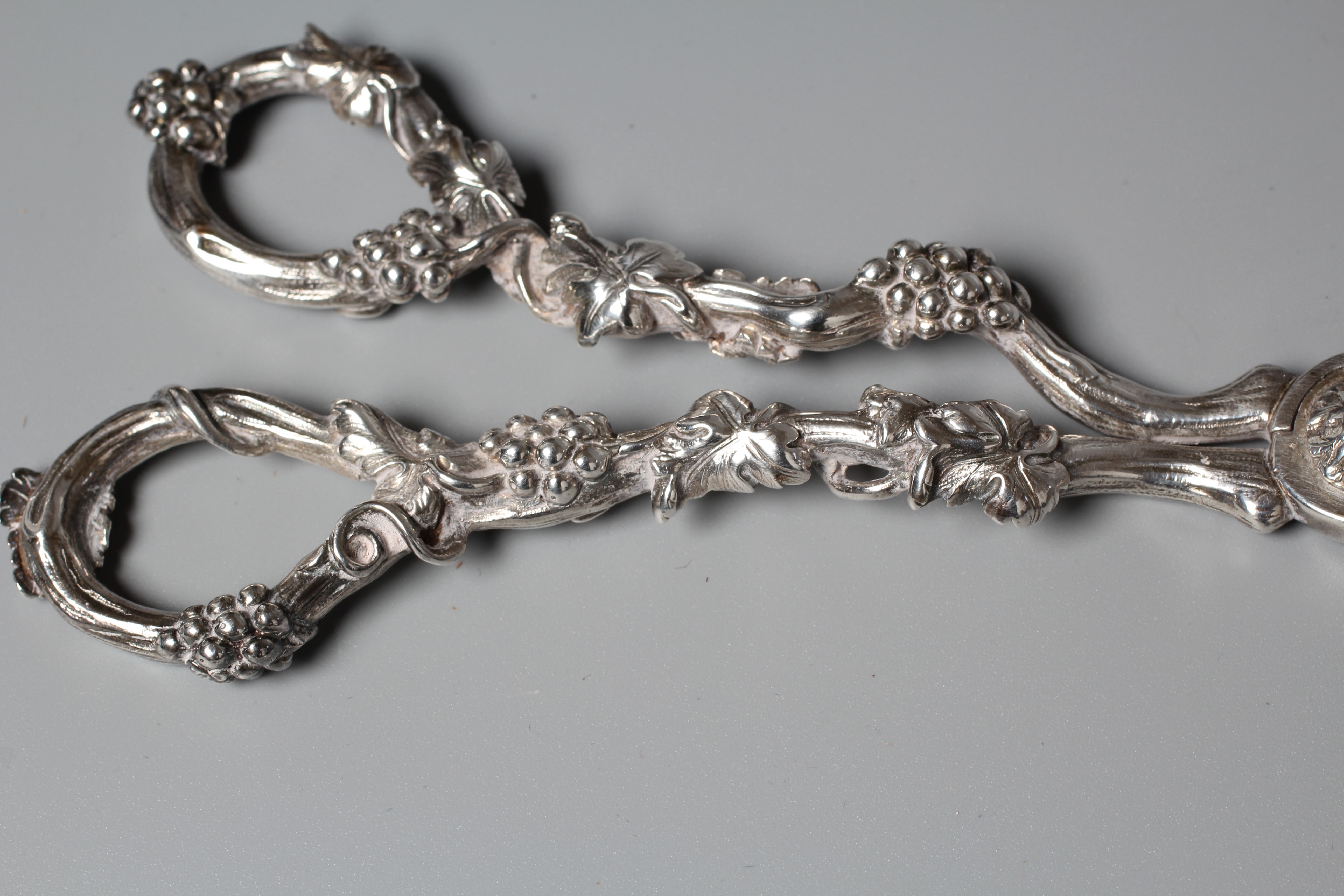 A PAIR OF WILLIAM IV GRAPE SCISSORS by William Theobalds, with cast fruiting vine handles and Image