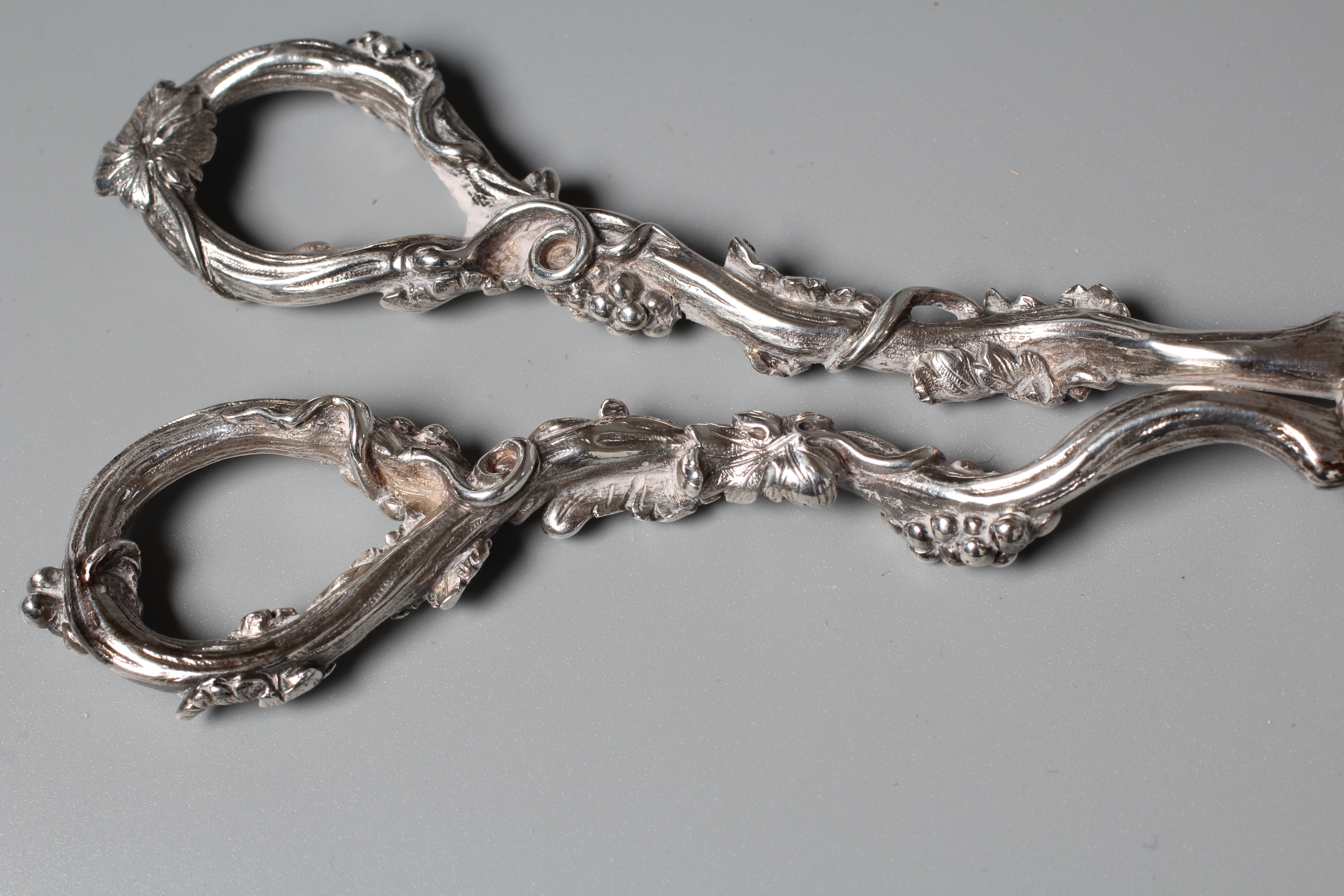 A PAIR OF WILLIAM IV GRAPE SCISSORS by William Theobalds, with cast fruiting vine handles and Image