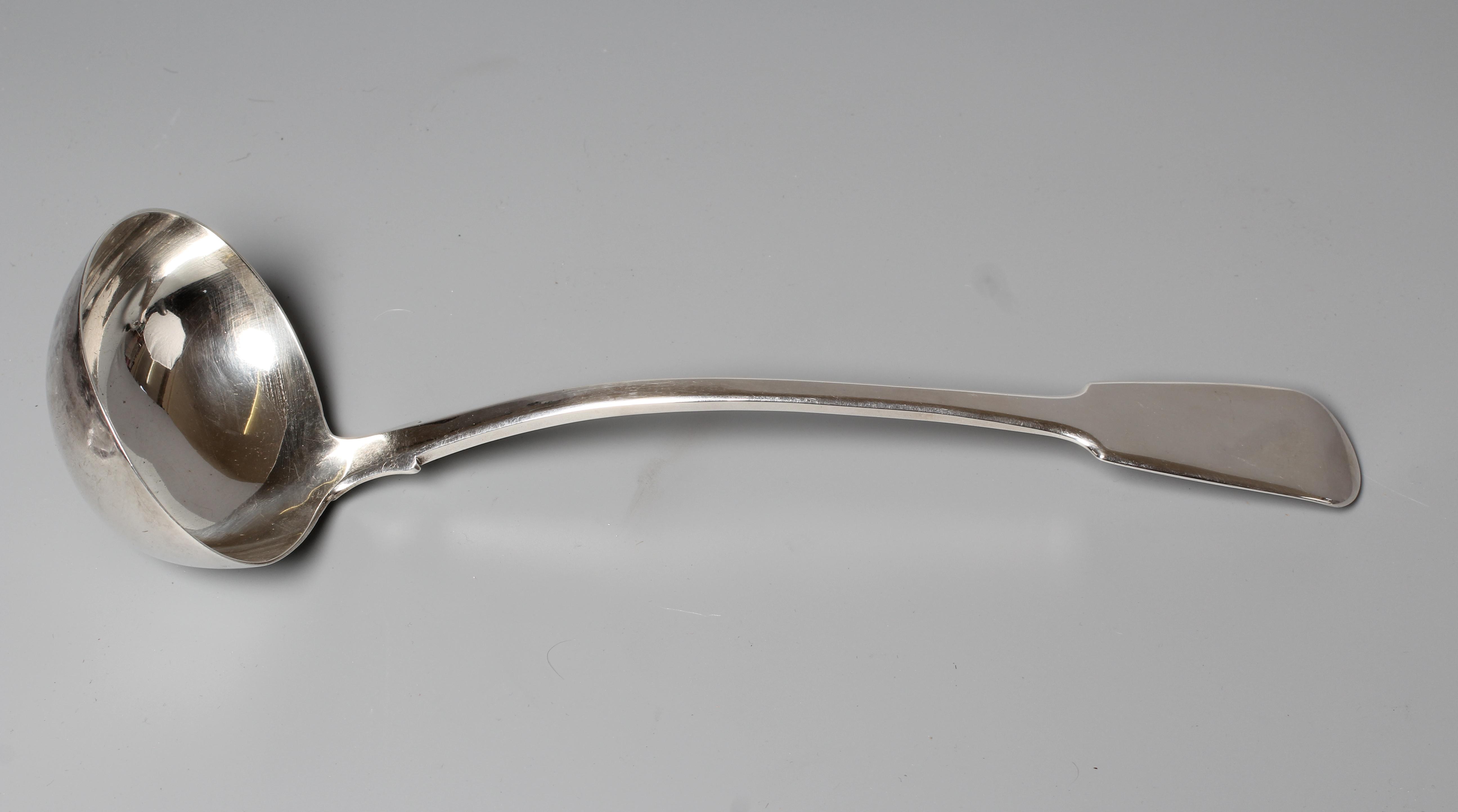 AN EARLY VICTORIAN FIDDLE PATTERN SOUP LADLE by Hayne & Cater, London 1847, 12" long, 8ozs 18dwts Image