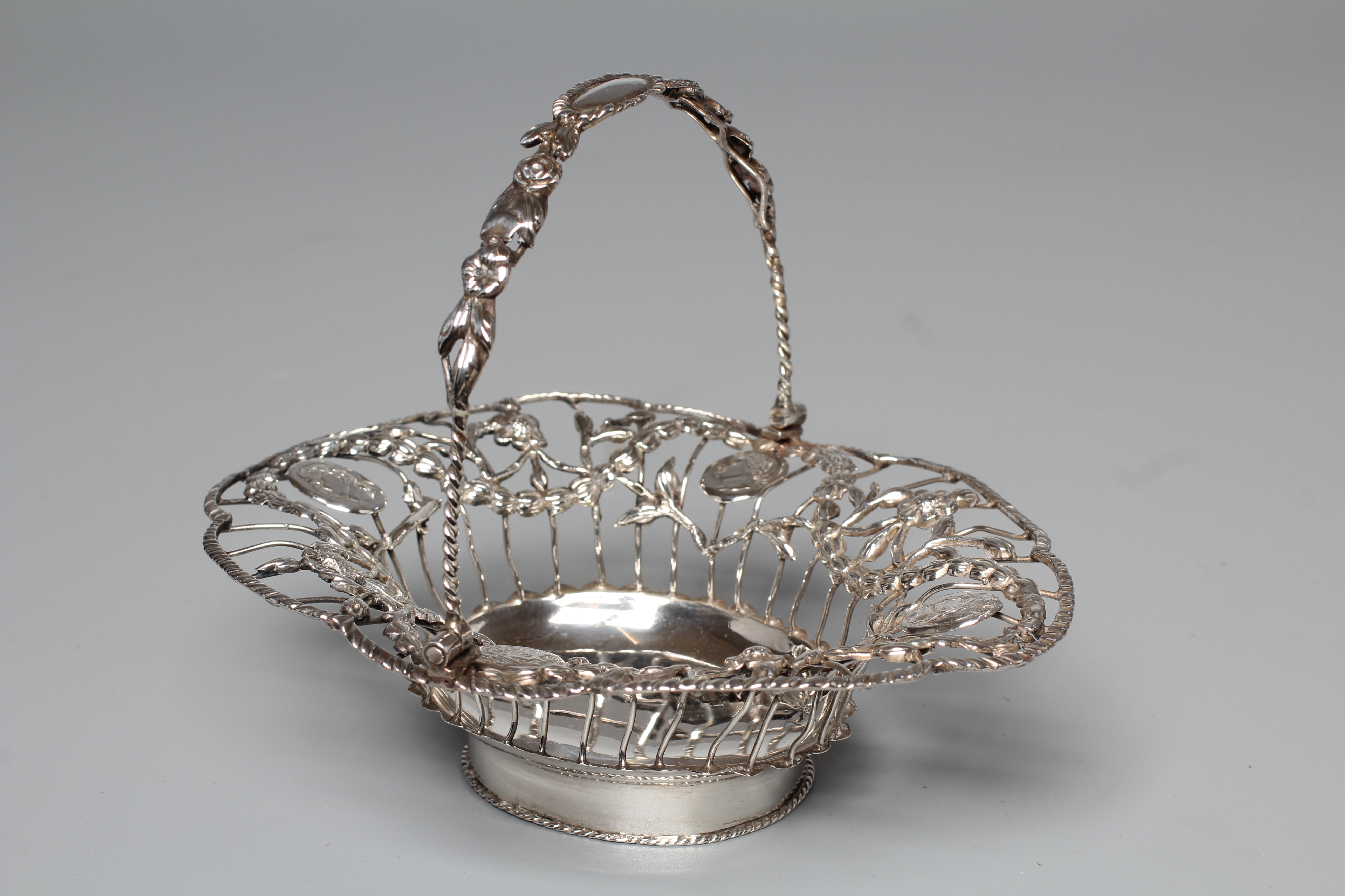 AN EARLY GEORGE III WIREWORK SWEETMEAT BASKET by Thomas Foster Image