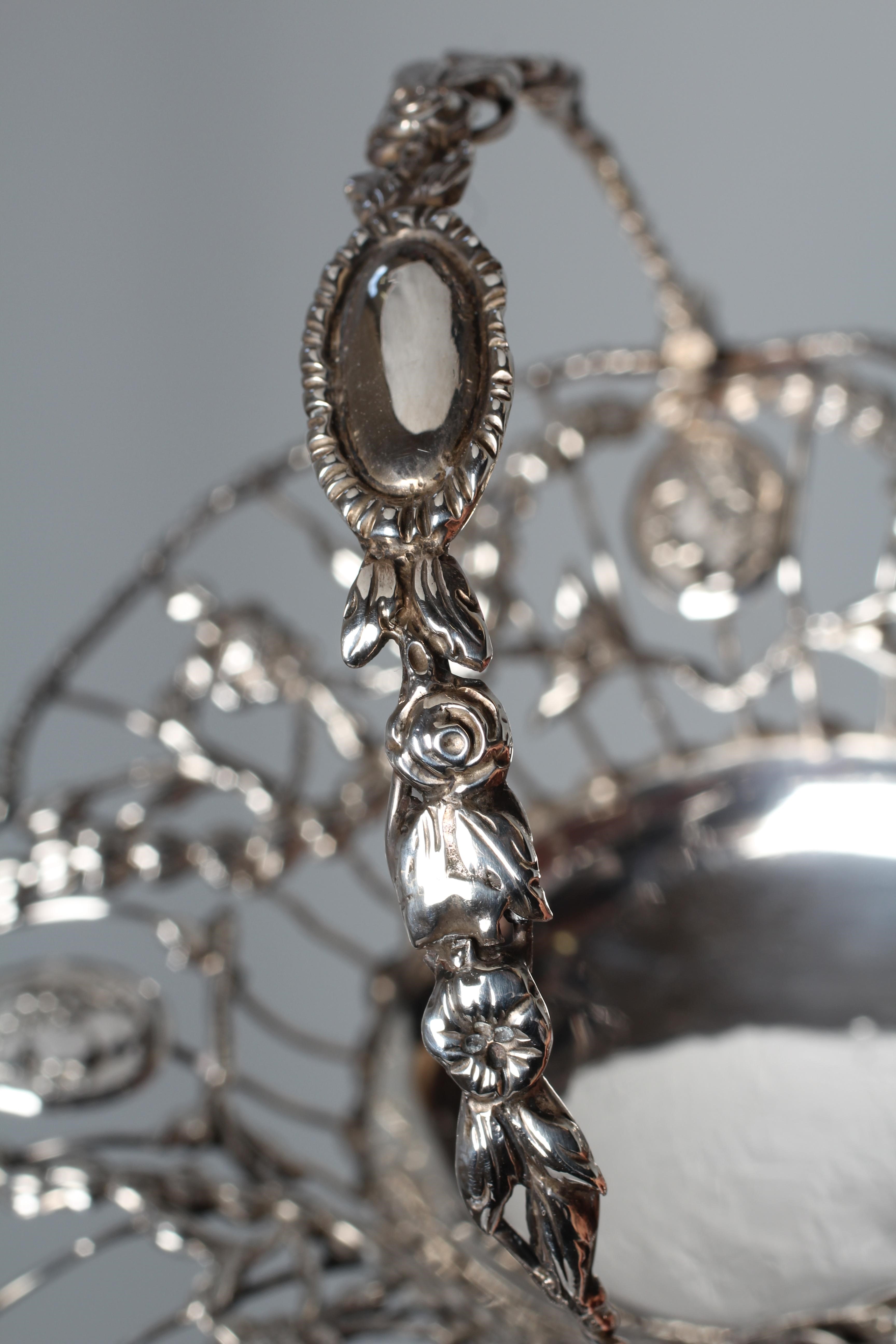 AN EARLY GEORGE III WIREWORK SWEETMEAT BASKET by Thomas Foster Image