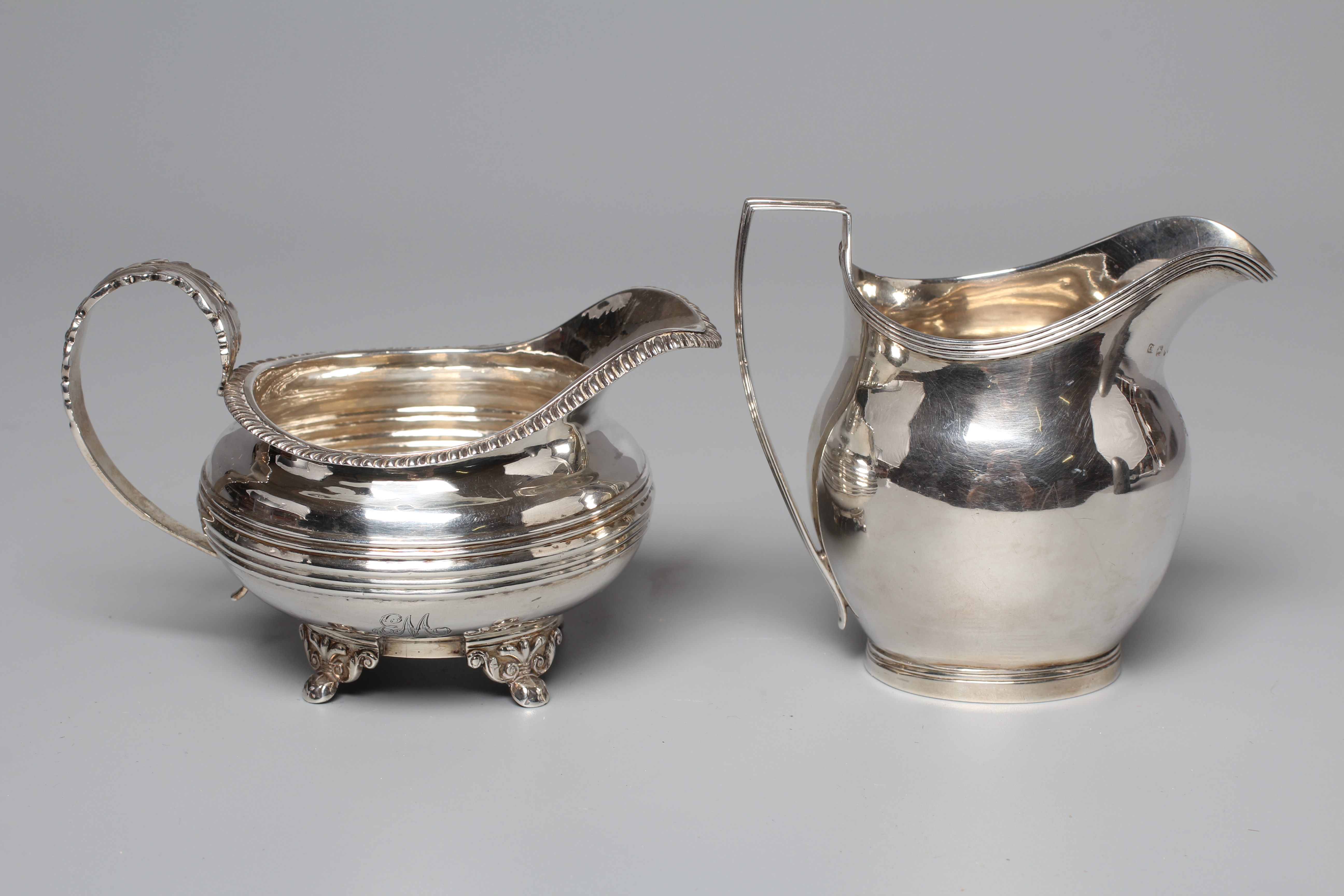A GEORGE IV MILK JUG by William M Traies Image