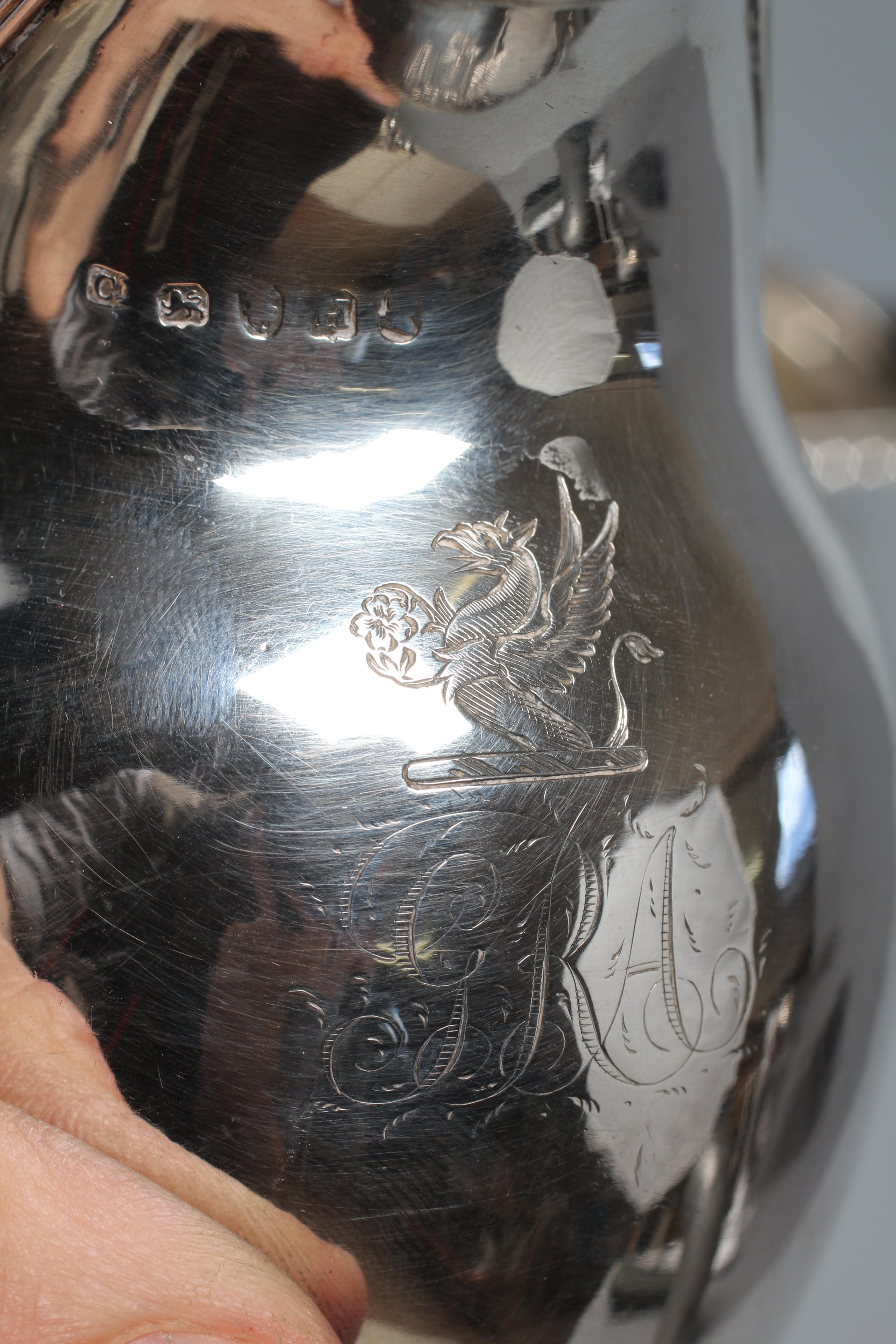 A GEORGE IV MILK JUG by William M Traies Image
