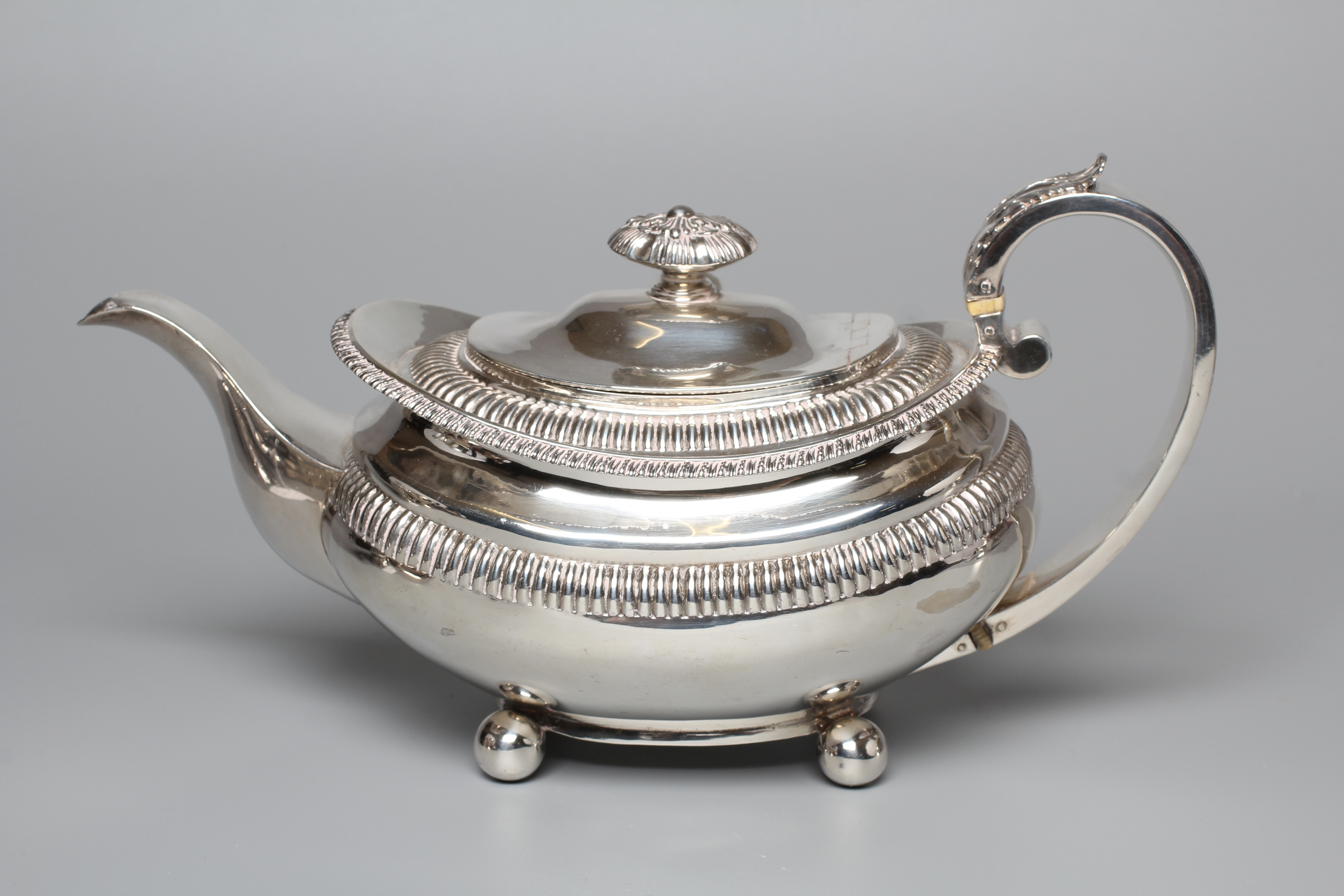 A GEORGE IV TEAPOT by Joseph Angell I Image