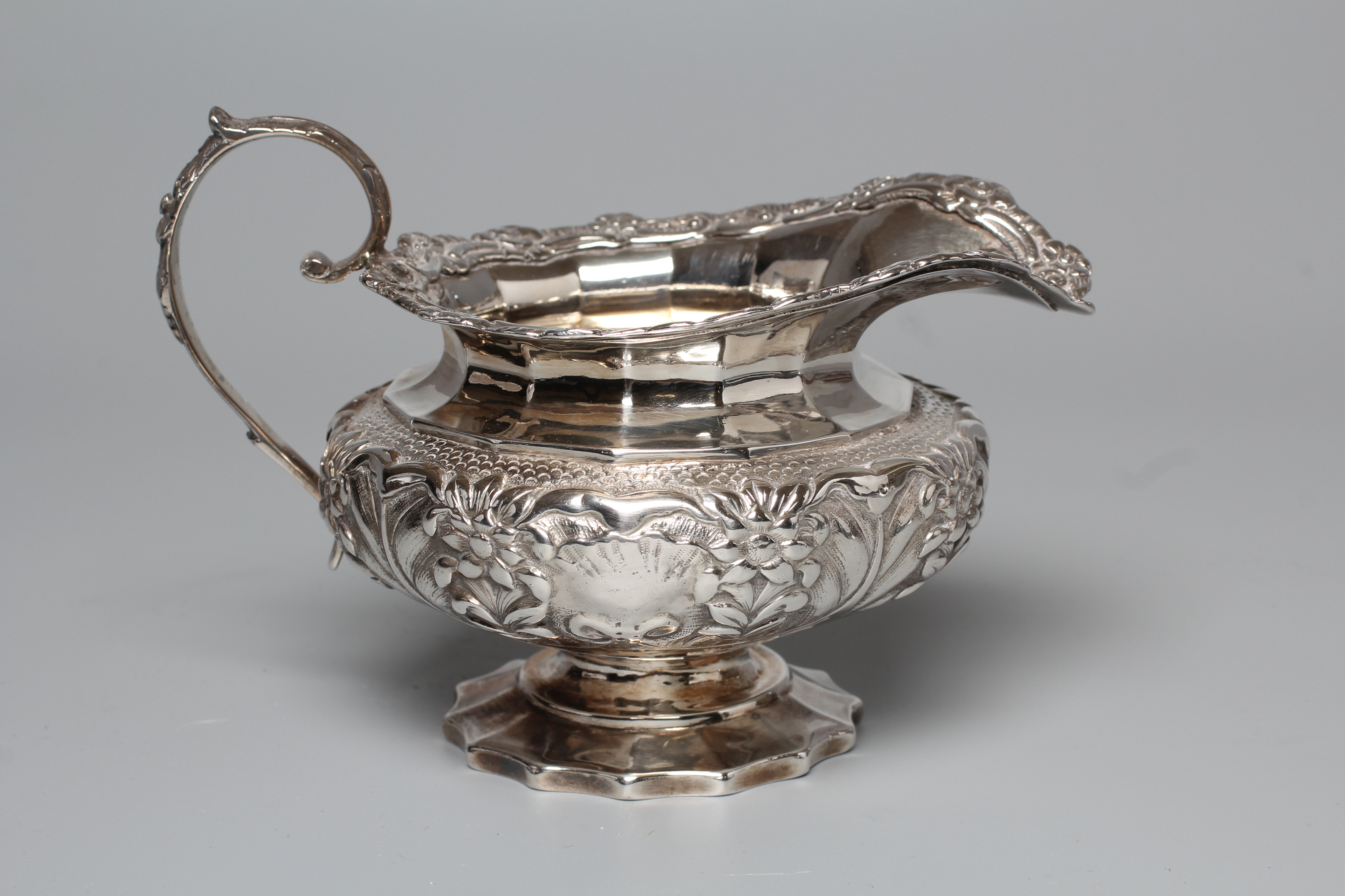 A GEORGE IV IRISH MILK JUG by Edward Power Image