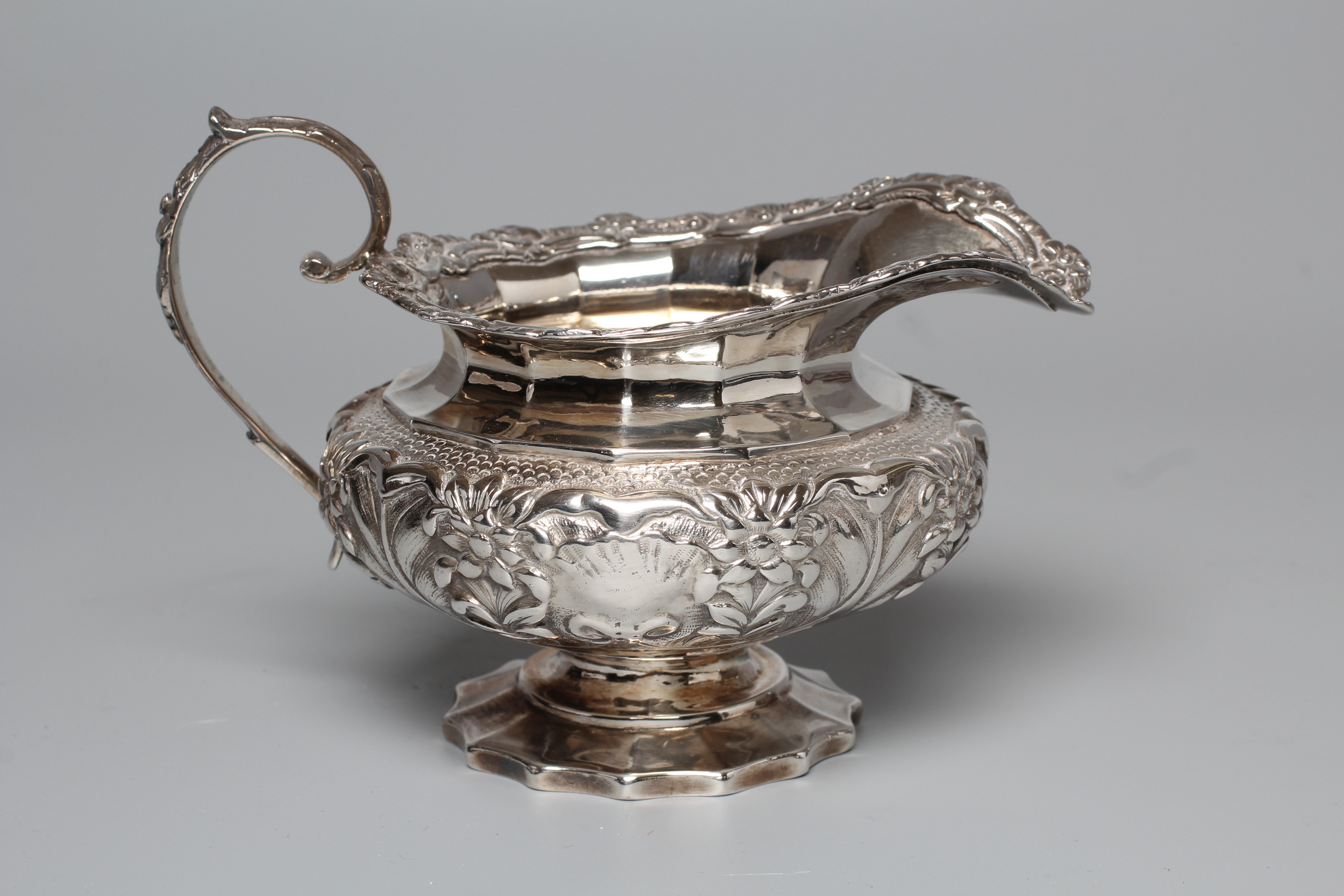 A GEORGE IV IRISH MILK JUG by Edward Power Image