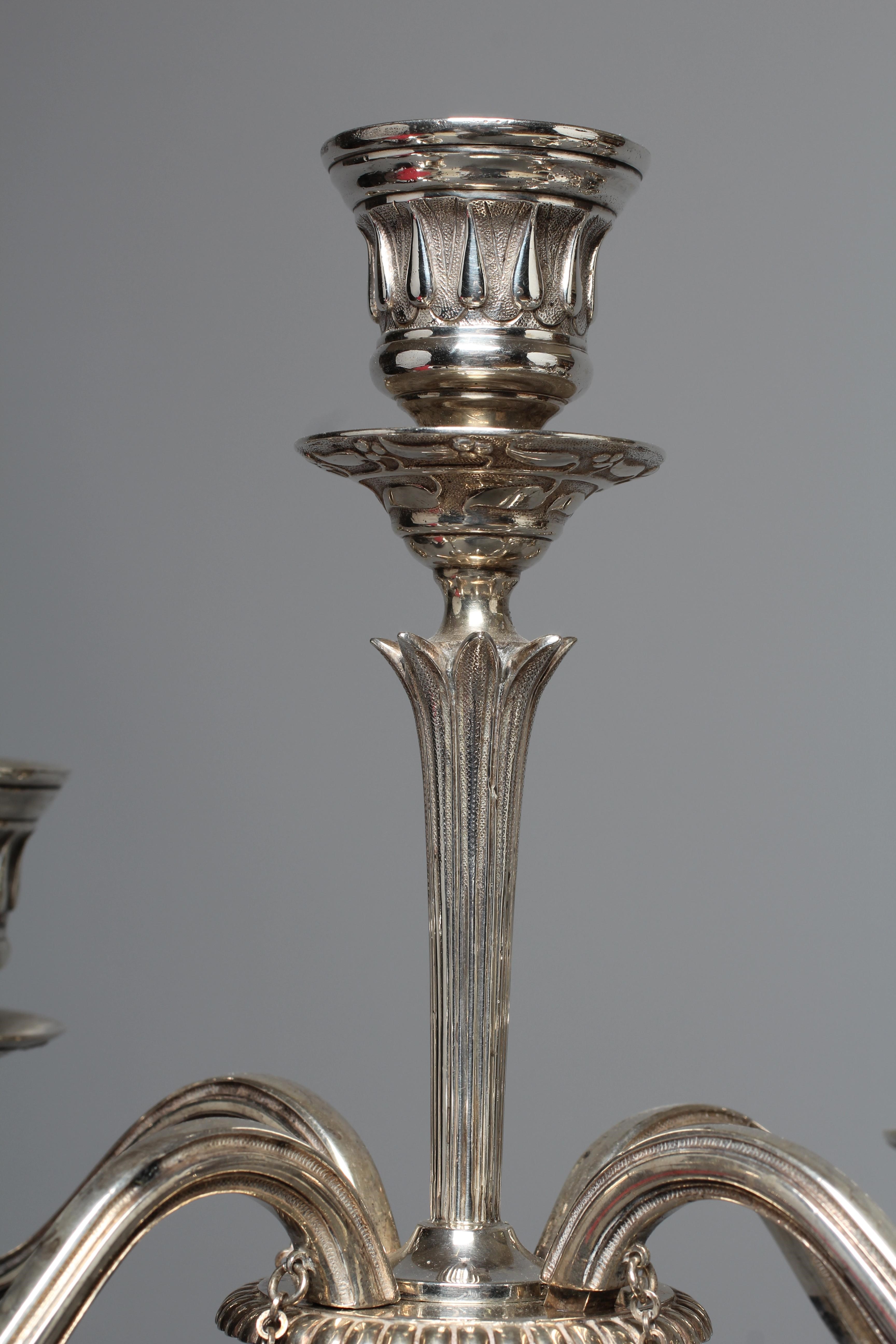 A PAIR OF VICTORIAN FOUR BRANCH FIVE LIGHT CANDELABRA by Frederick Elkington Image