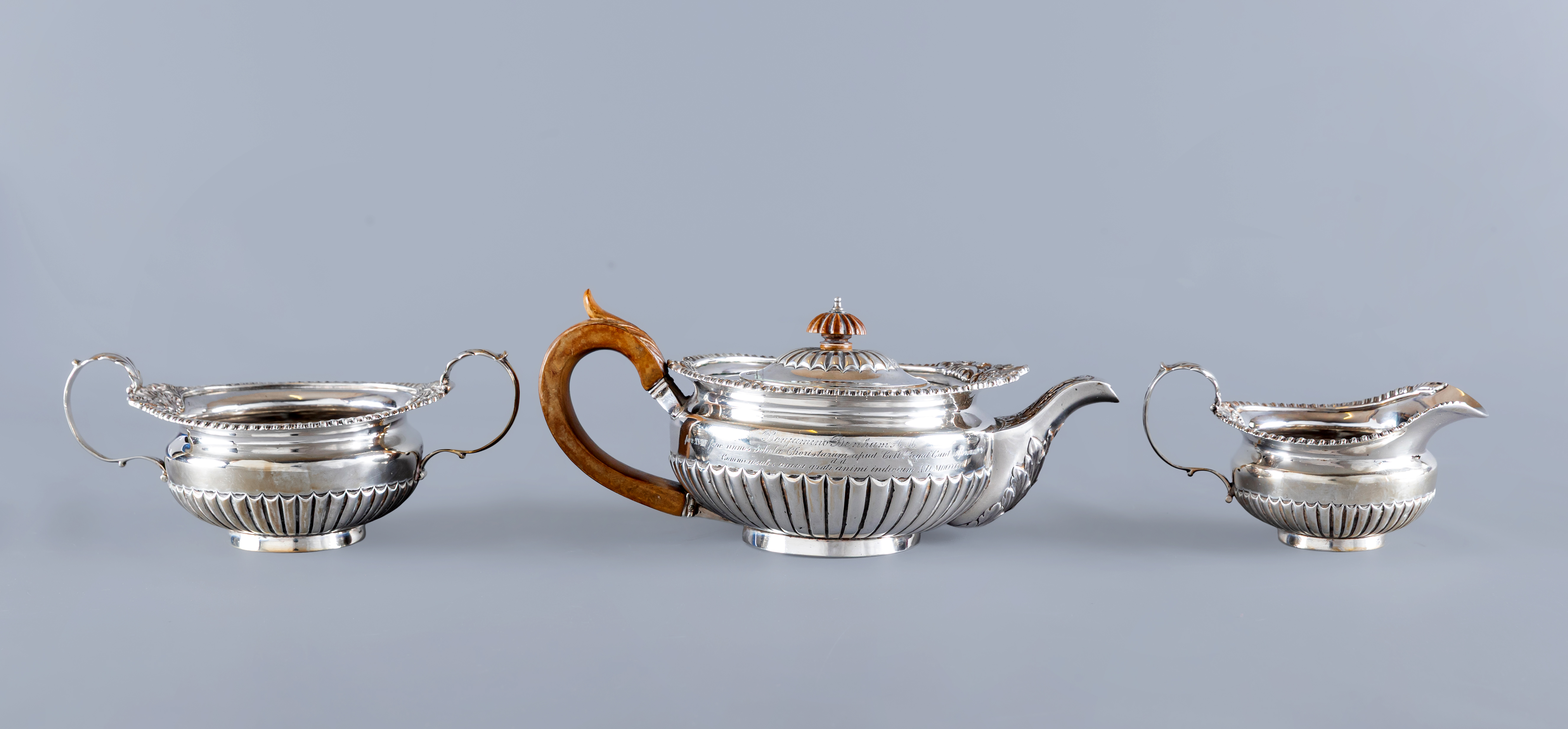 A COMPOSITE LATE VICTORIAN/EDWARDIAN THREE PIECE TEA SERVICE Image