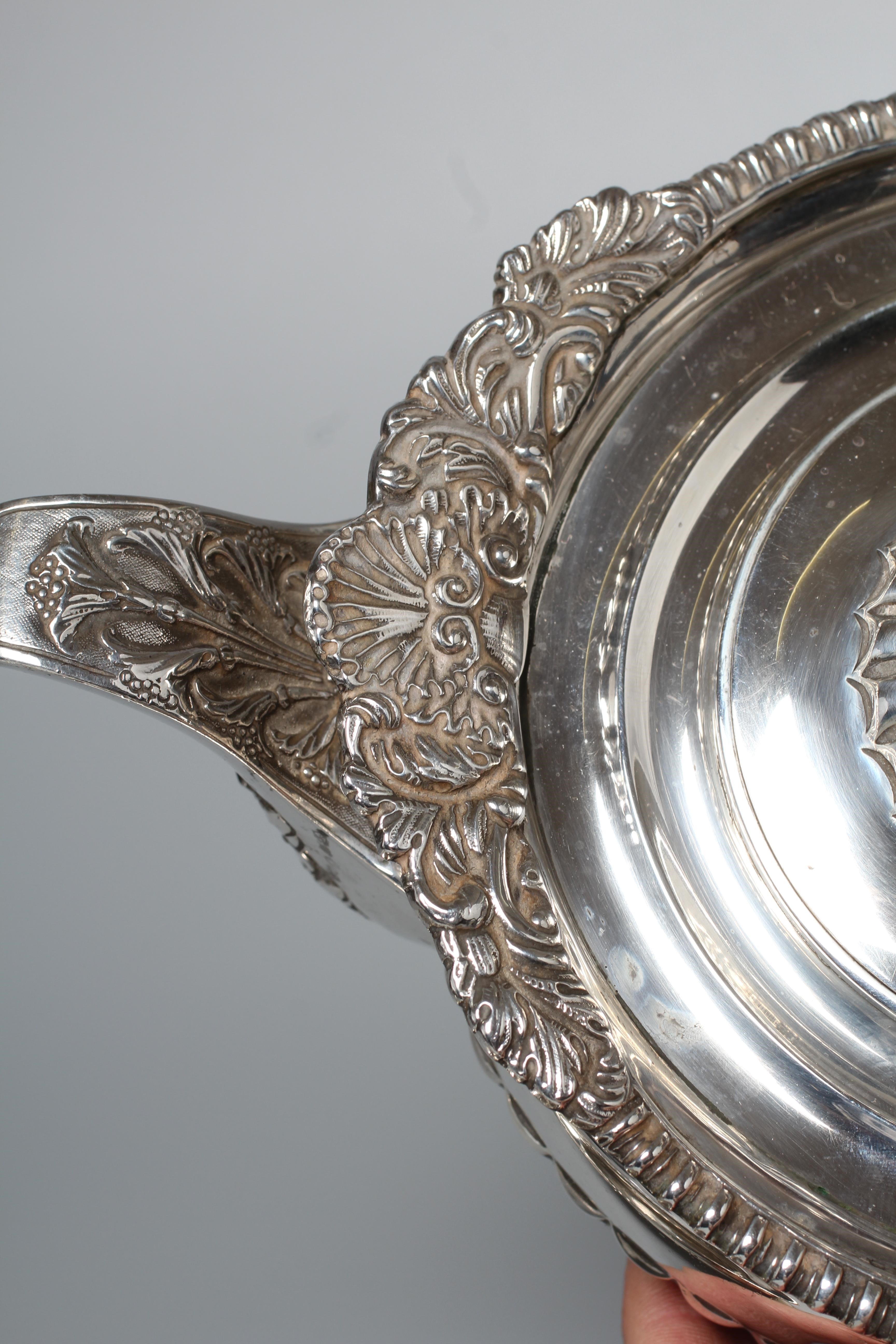A COMPOSITE LATE VICTORIAN/EDWARDIAN THREE PIECE TEA SERVICE Image