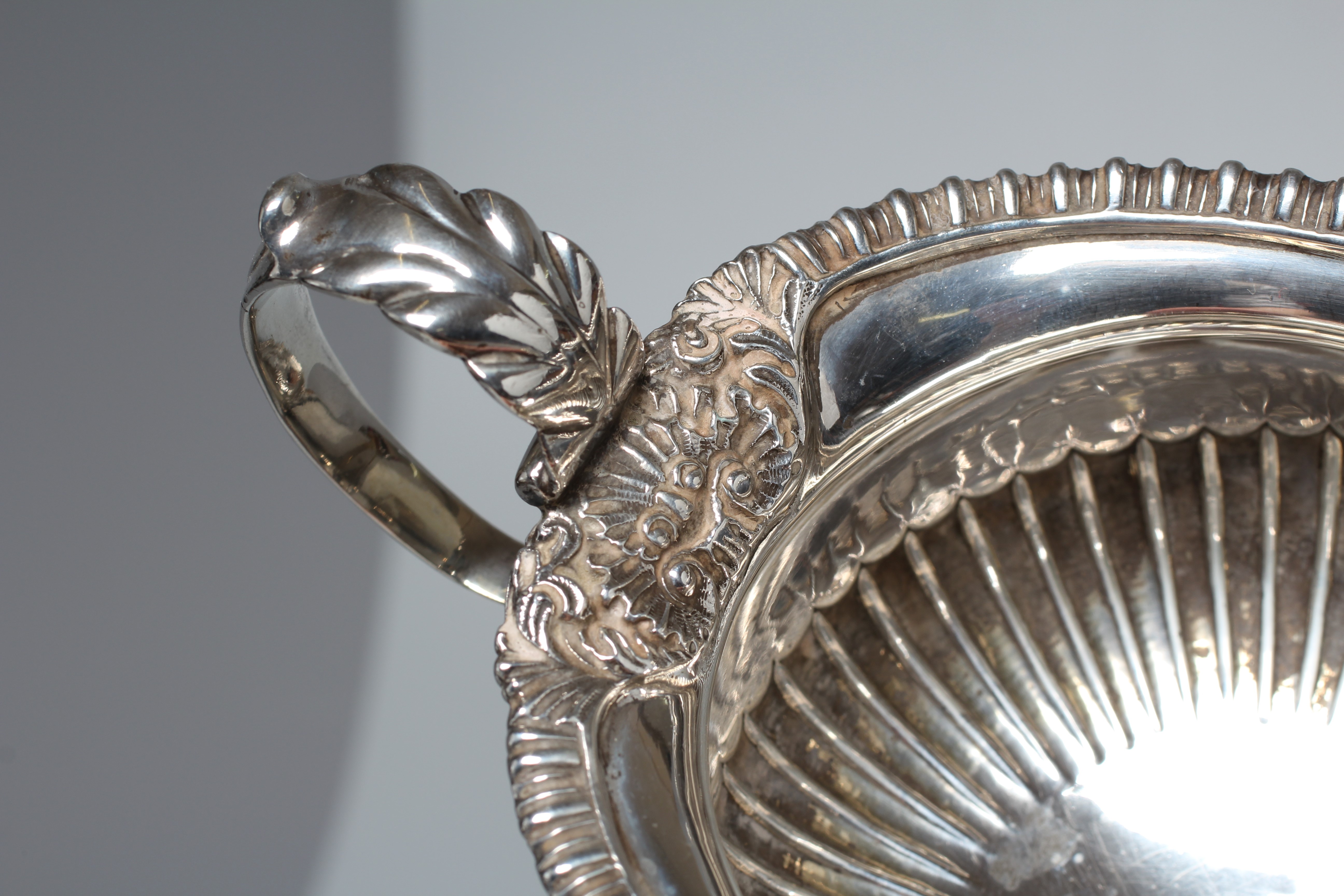 A COMPOSITE LATE VICTORIAN/EDWARDIAN THREE PIECE TEA SERVICE Image