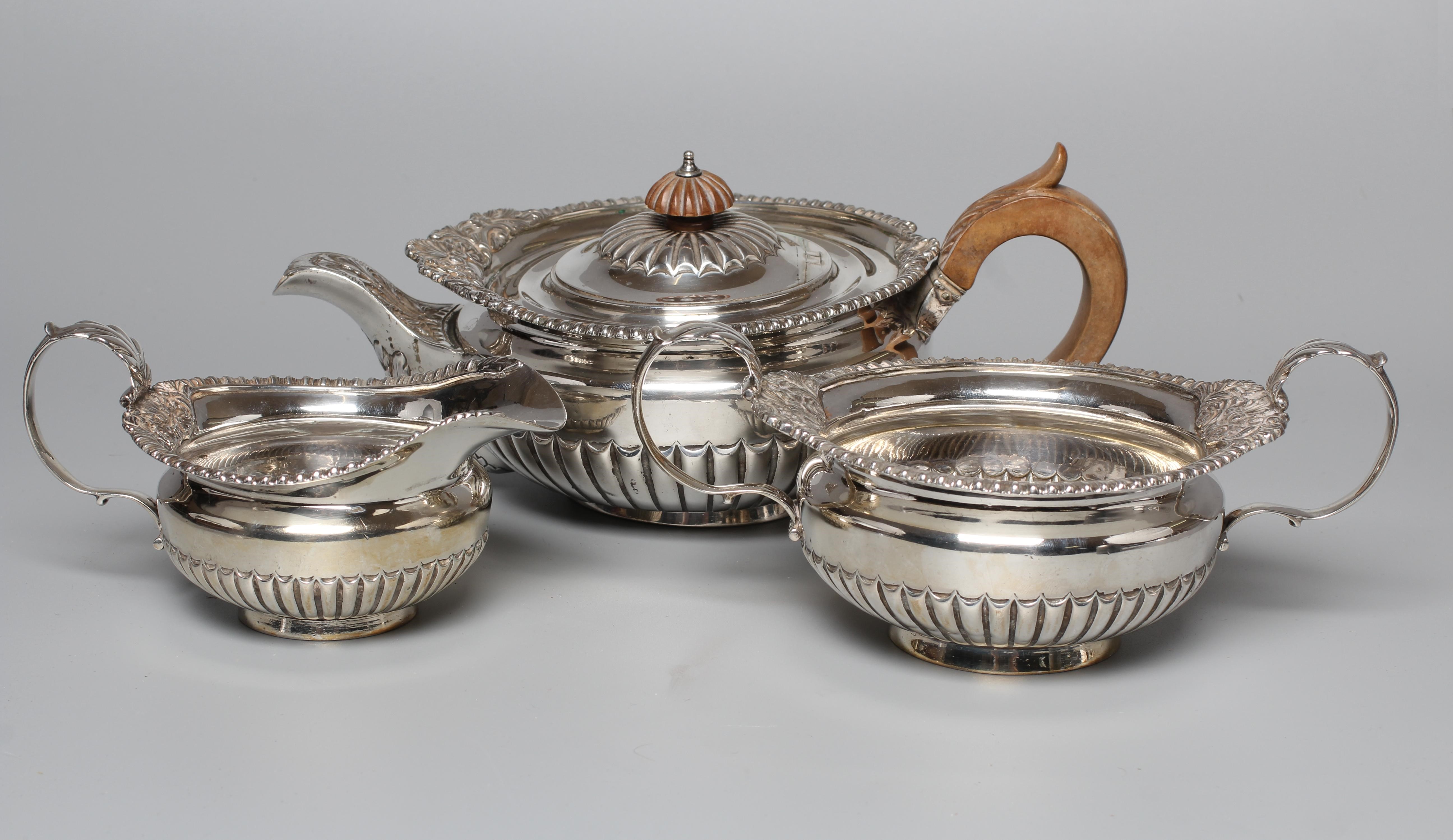 A COMPOSITE LATE VICTORIAN/EDWARDIAN THREE PIECE TEA SERVICE Image