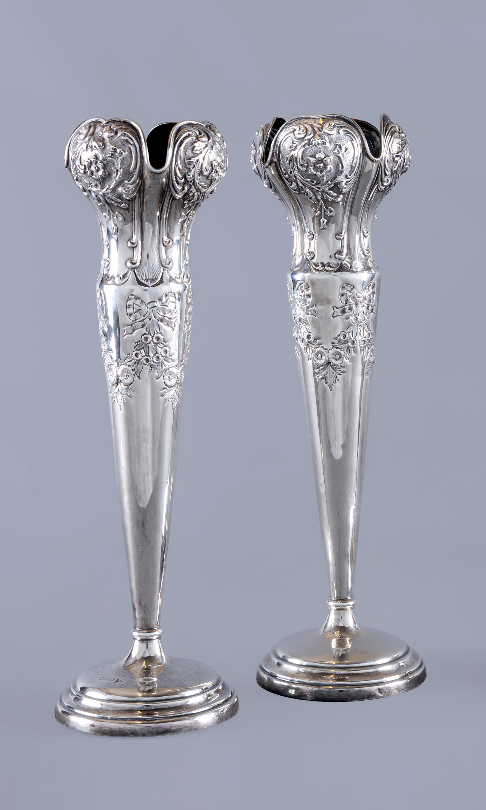 A PAIR OF EDWARD VII TALL VASES by Walker & Hall Image