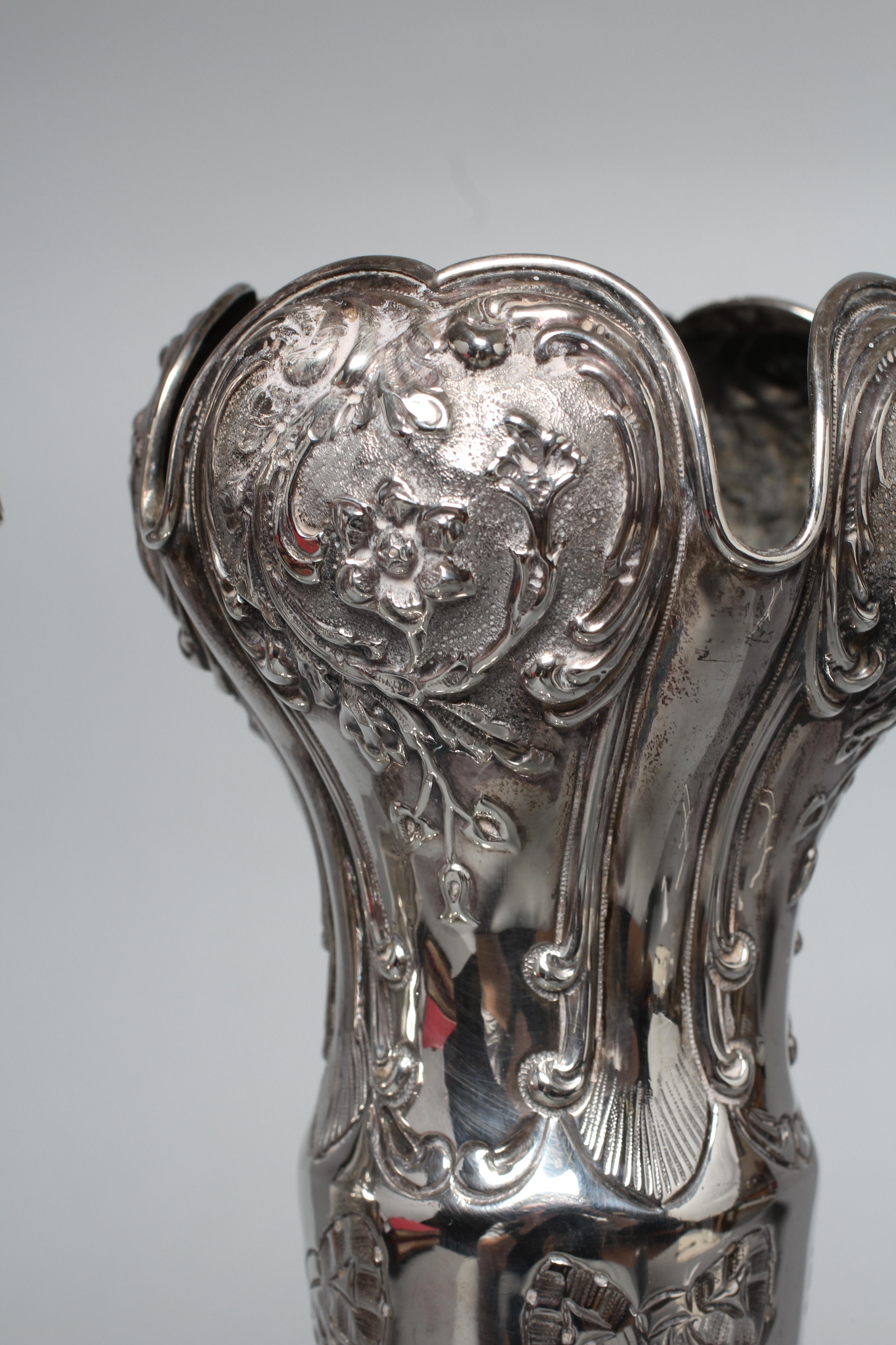 A PAIR OF EDWARD VII TALL VASES by Walker & Hall Image