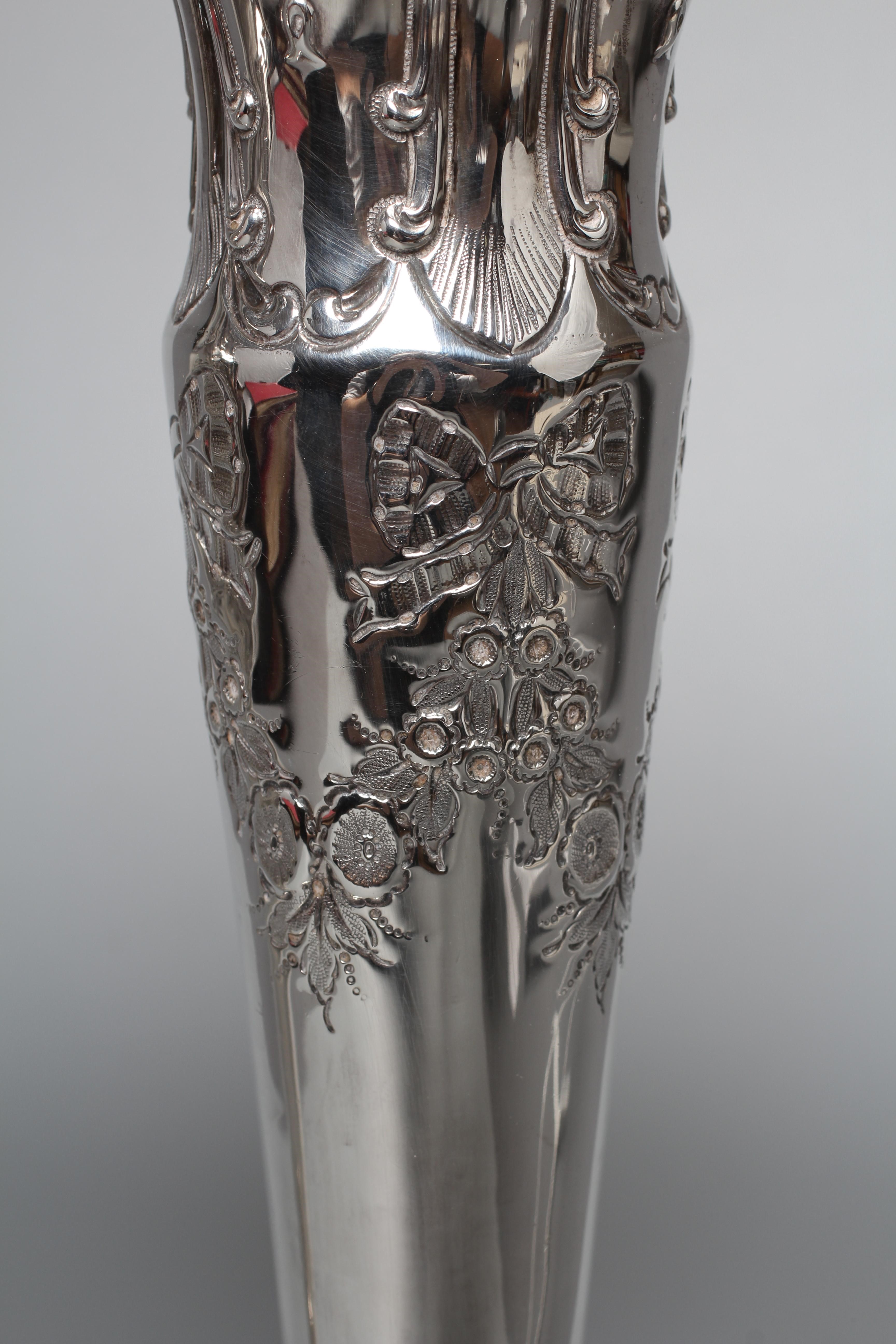 A PAIR OF EDWARD VII TALL VASES by Walker & Hall Image