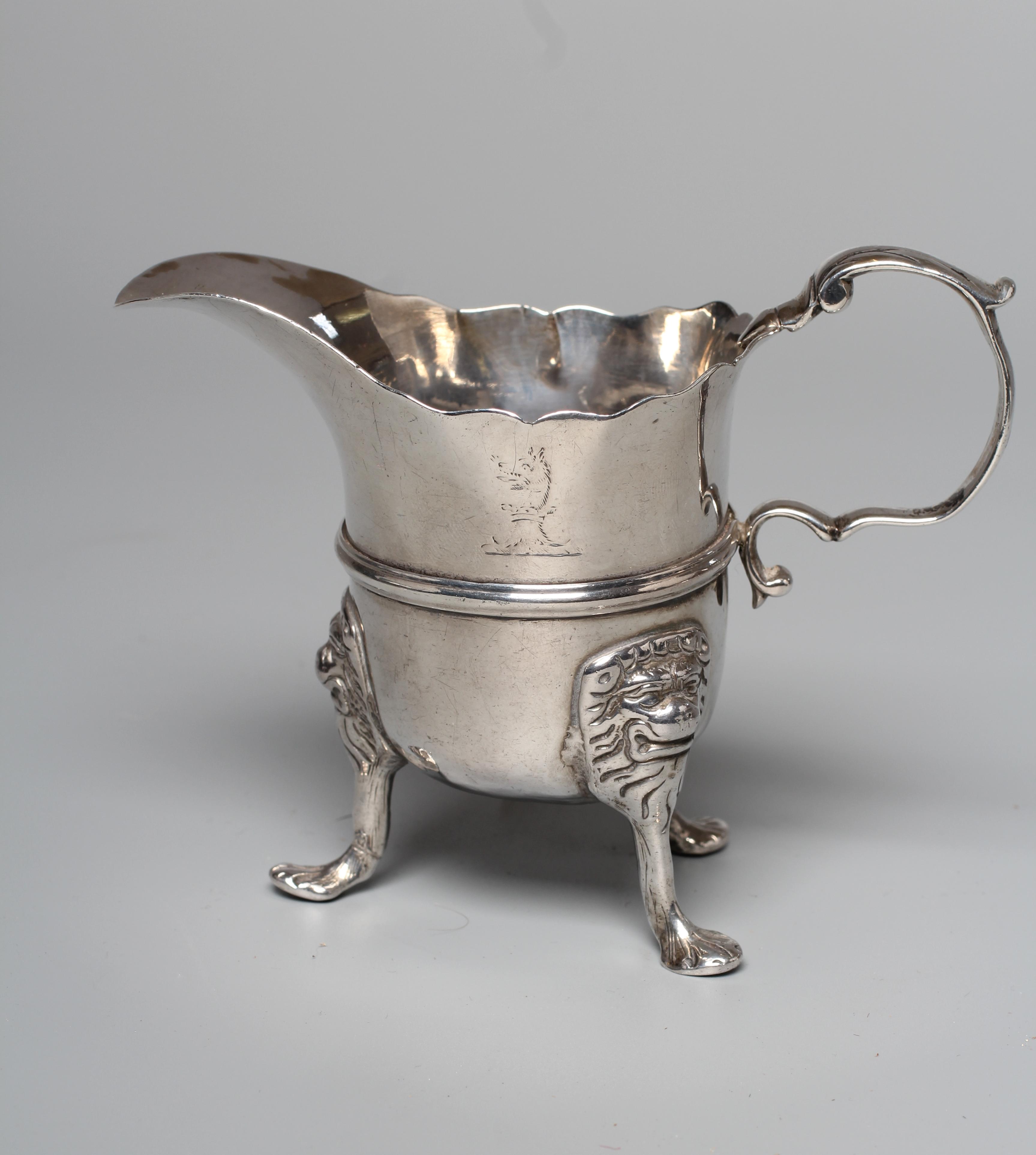 A LATE GEORGE III IRISH MILK JUG by William Thompson Image