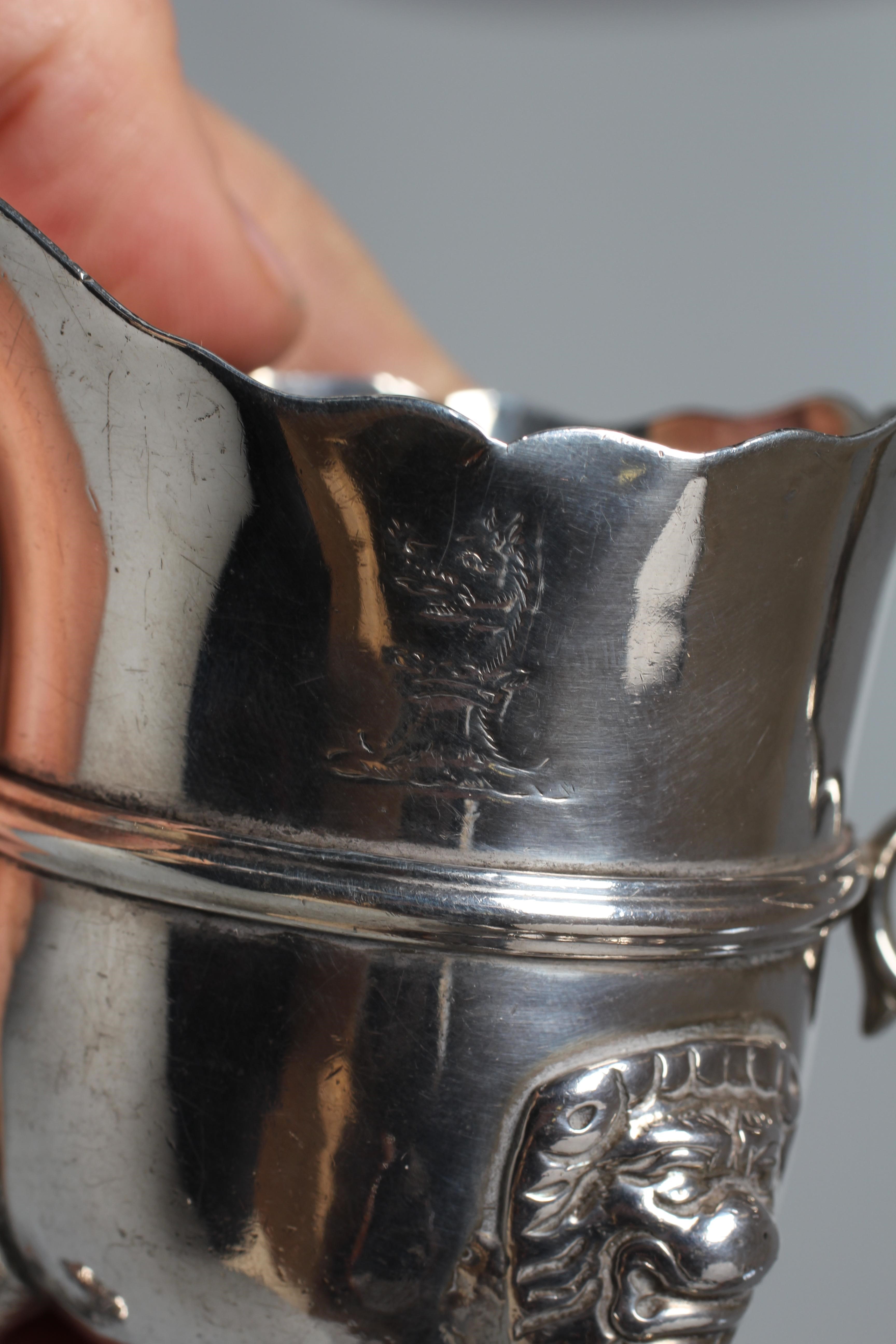 A LATE GEORGE III IRISH MILK JUG by William Thompson Image