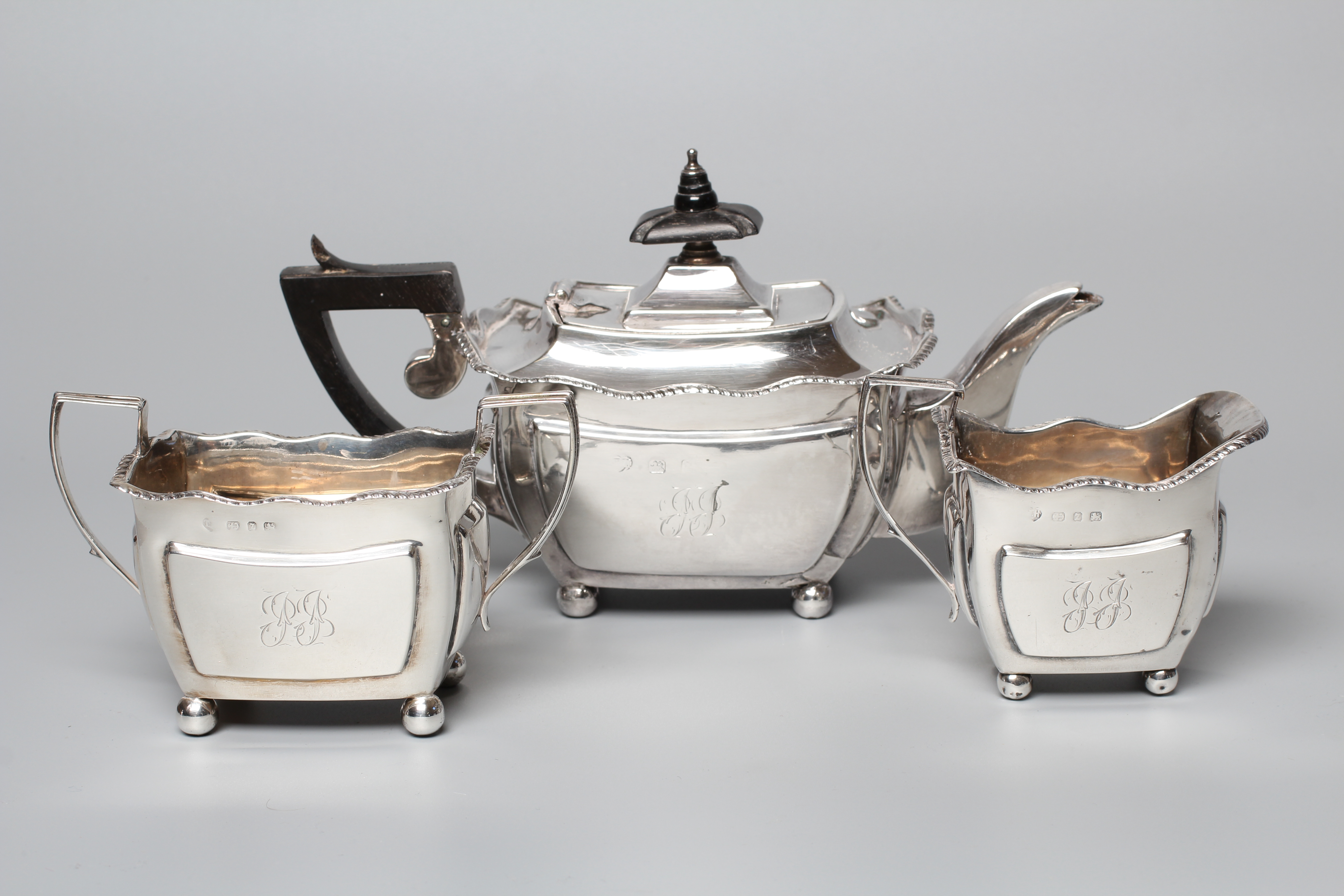 A LATE VICTORIAN BACHELOR'S THREE PIECE TEA SERVICE by Thomas Hayes Image