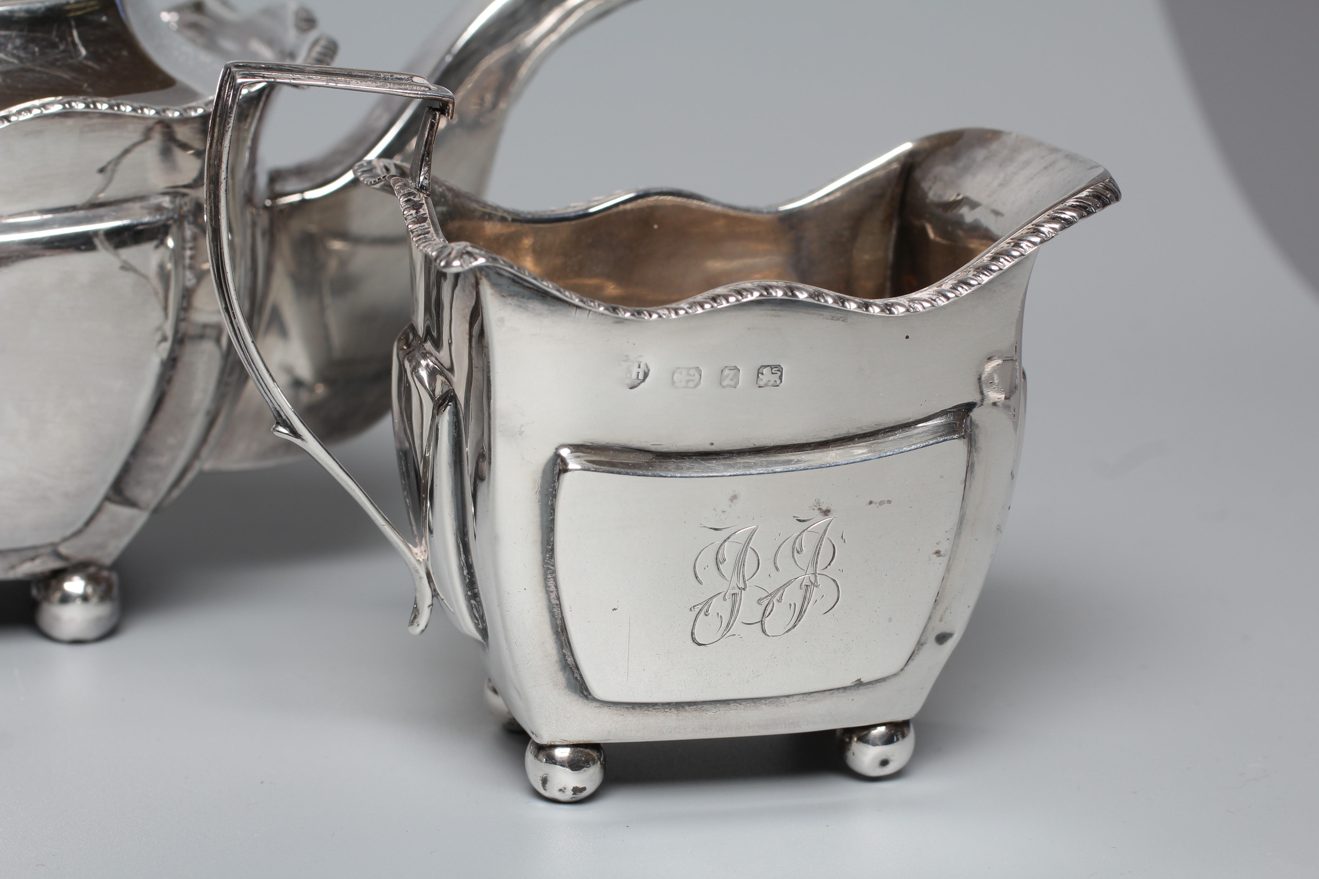 A LATE VICTORIAN BACHELOR'S THREE PIECE TEA SERVICE by Thomas Hayes Image