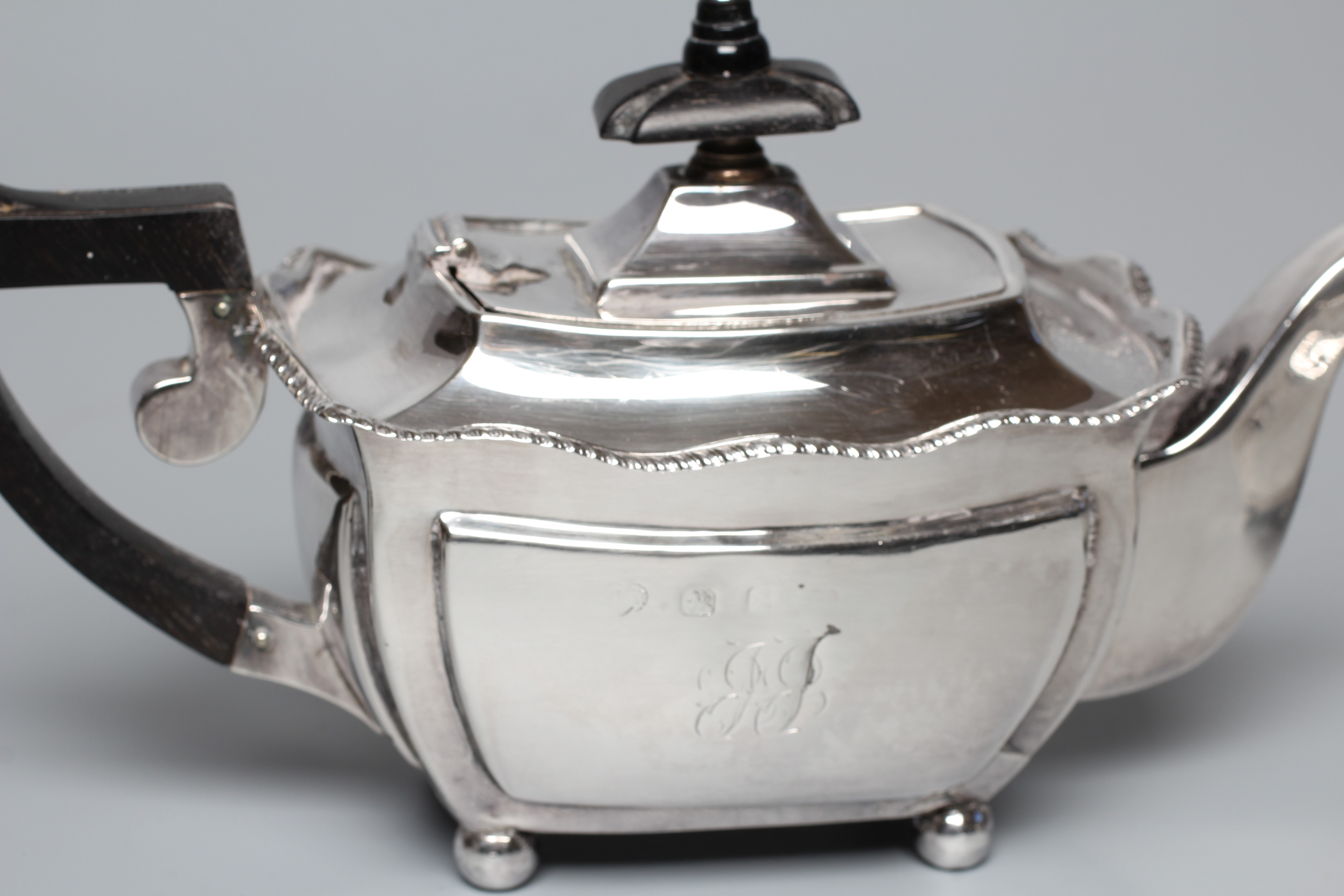 A LATE VICTORIAN BACHELOR'S THREE PIECE TEA SERVICE by Thomas Hayes Image
