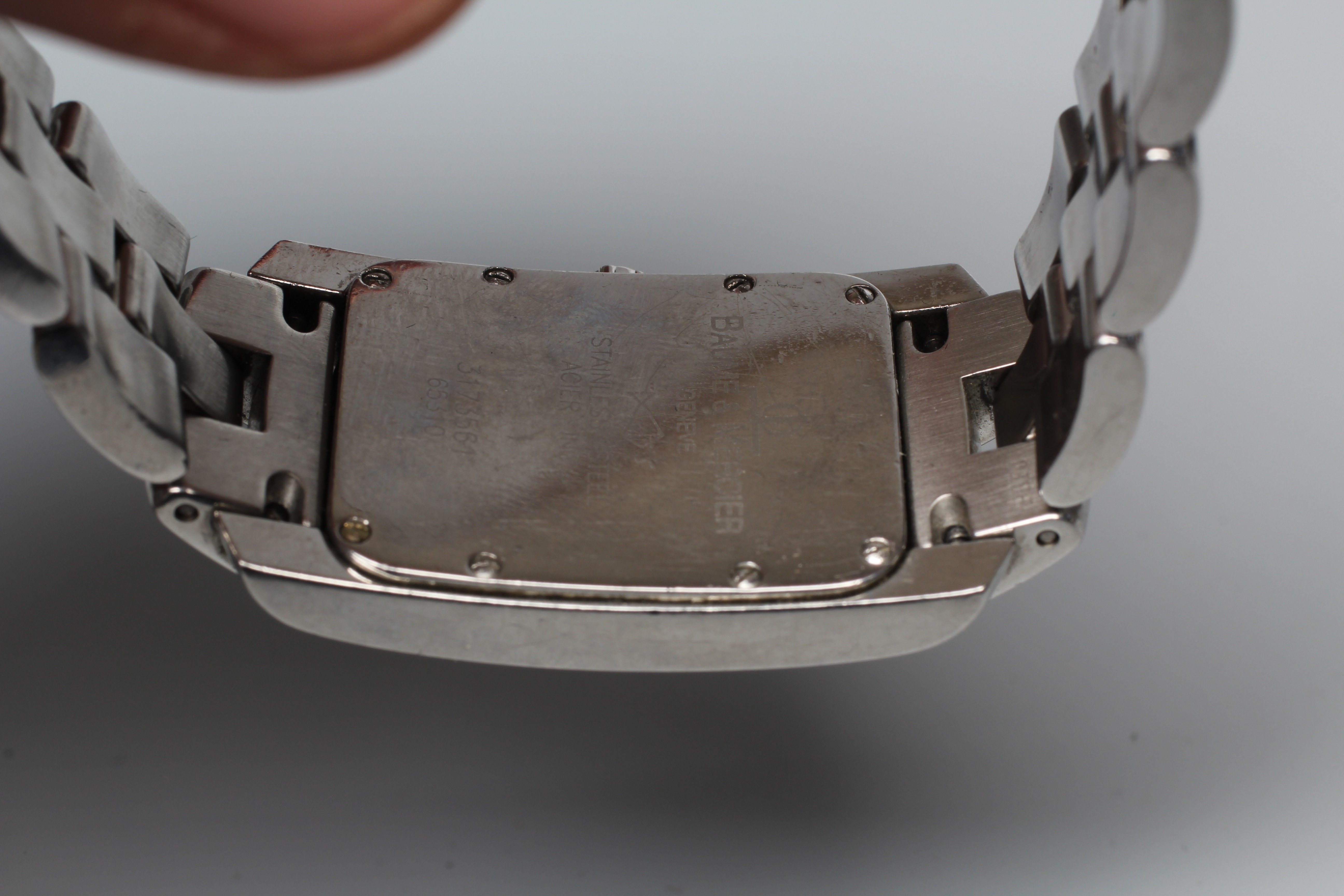 A GENTLEMAN'S BAUME & MERCIER HAMPTON MILLEIS STAINLESS TANK WRISTWATCH Image