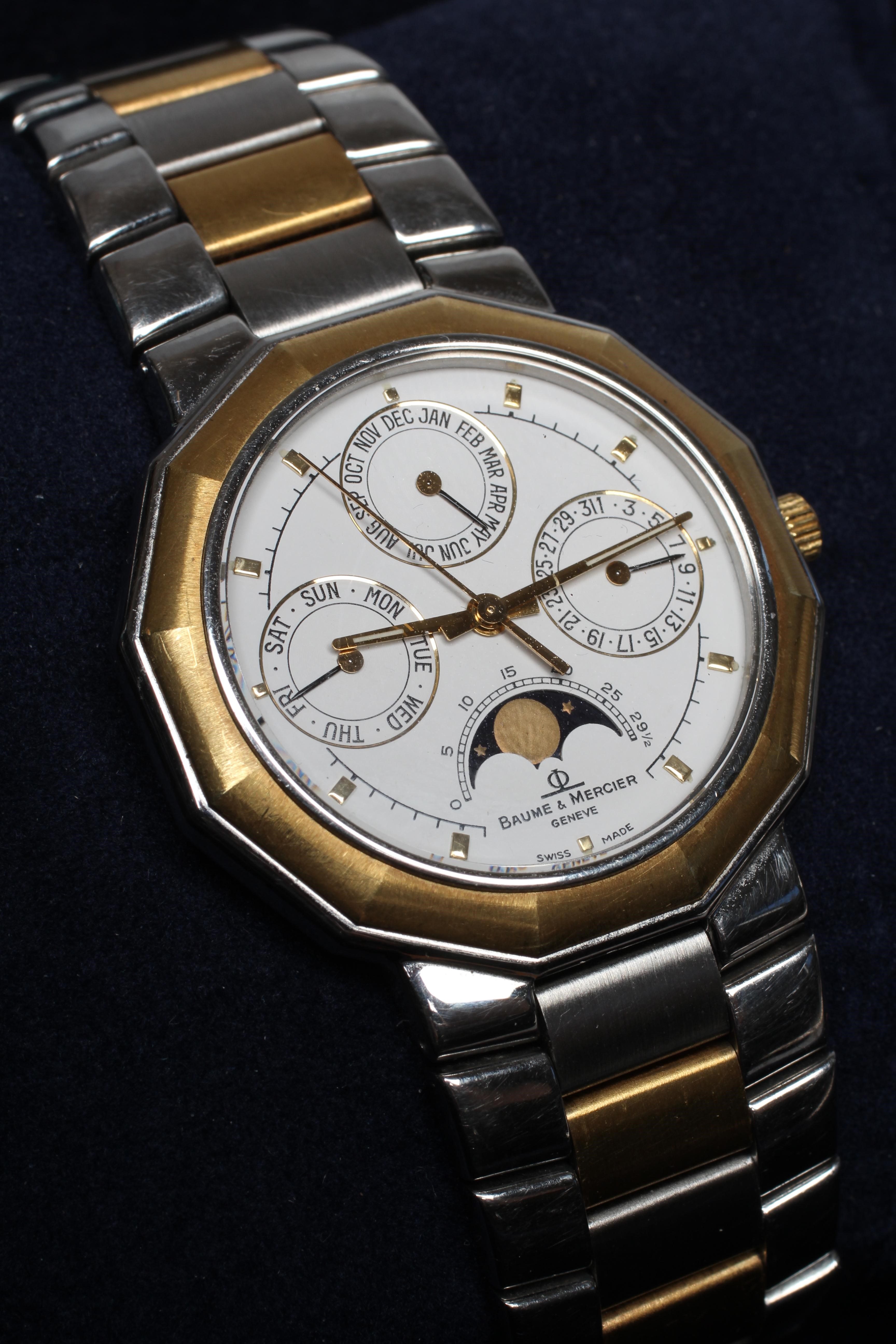 A GENTLEMAN'S BAUME & MERCIER STAINLESS TRIPLE CALENDAR WRISTWATCH Image